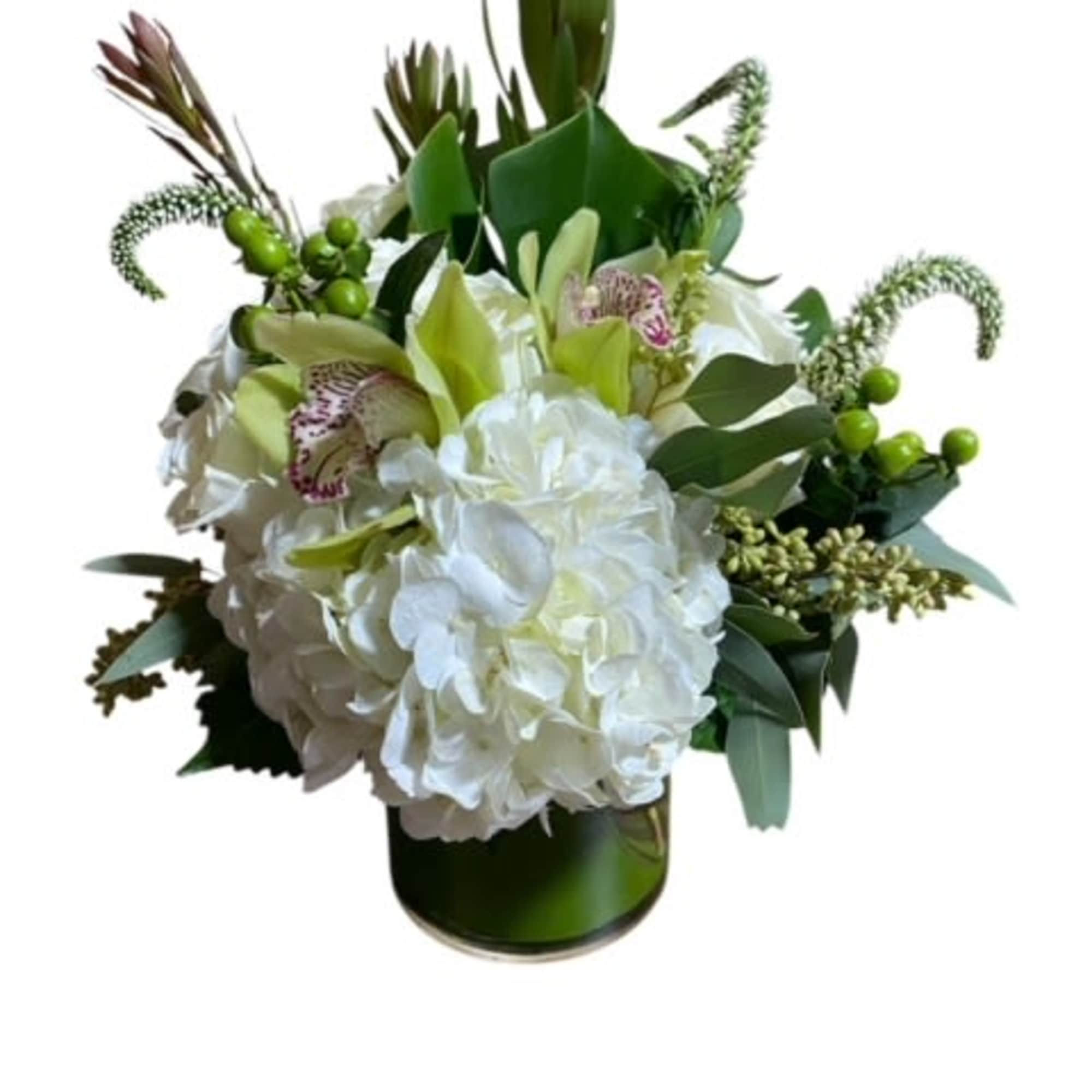 A premium designer&#039;s choice arrangement using season white flowers in short vase.