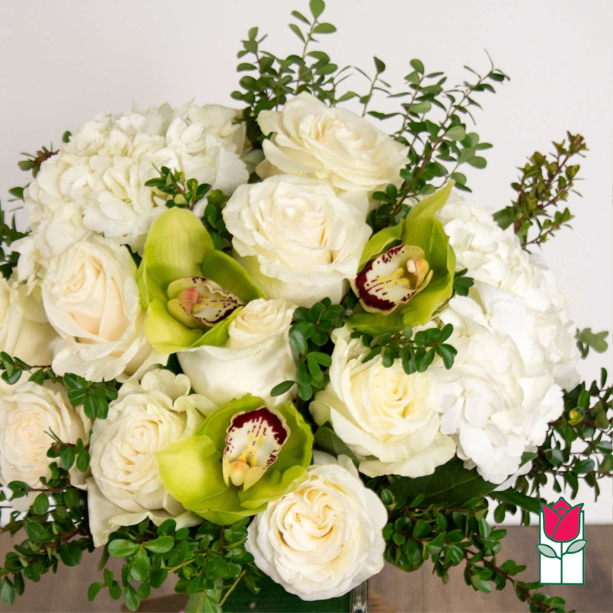 Elevate your space with the Beretania Florist Compact Bouquet, a charming floral