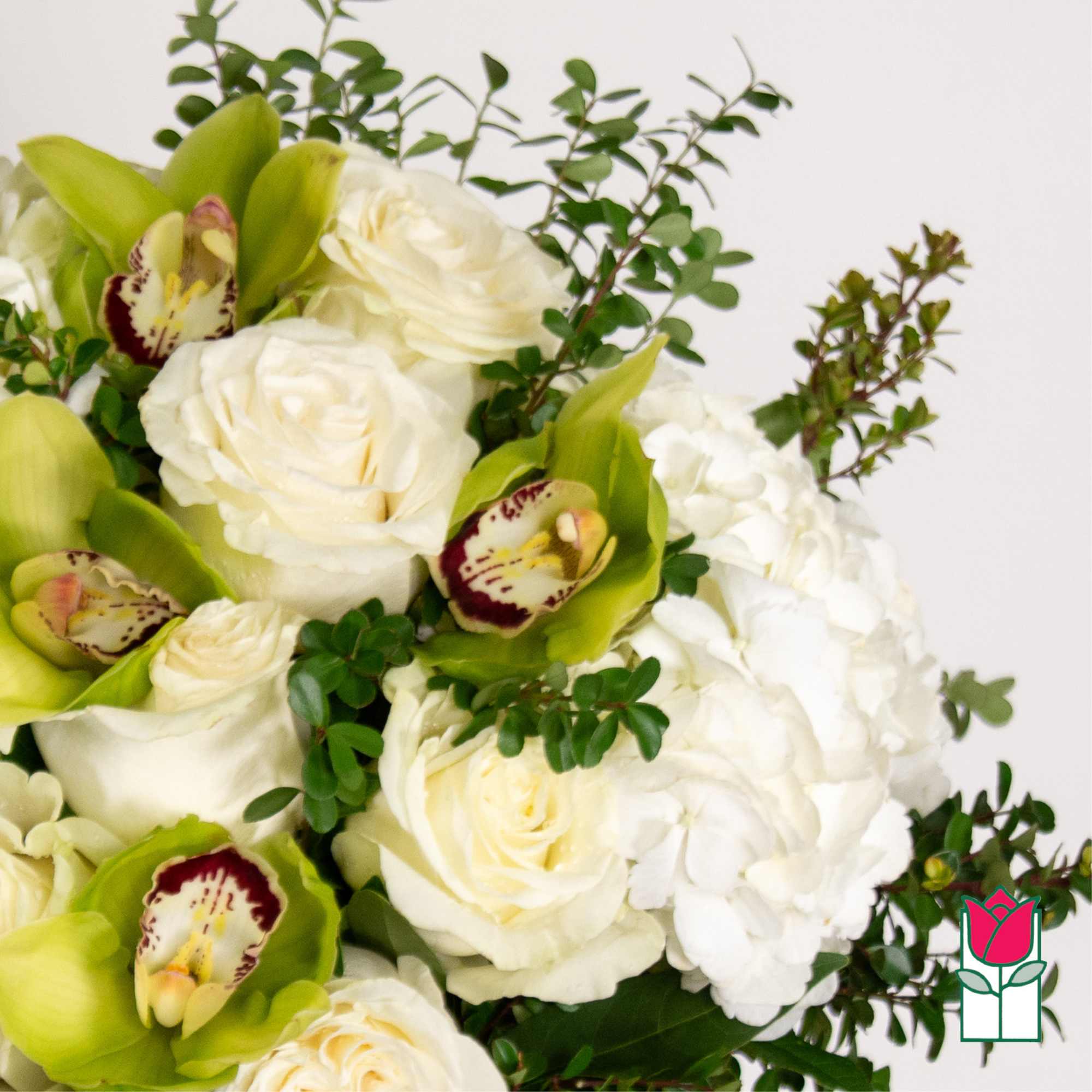 Elevate your space with the Beretania Florist Compact Bouquet, a charming floral