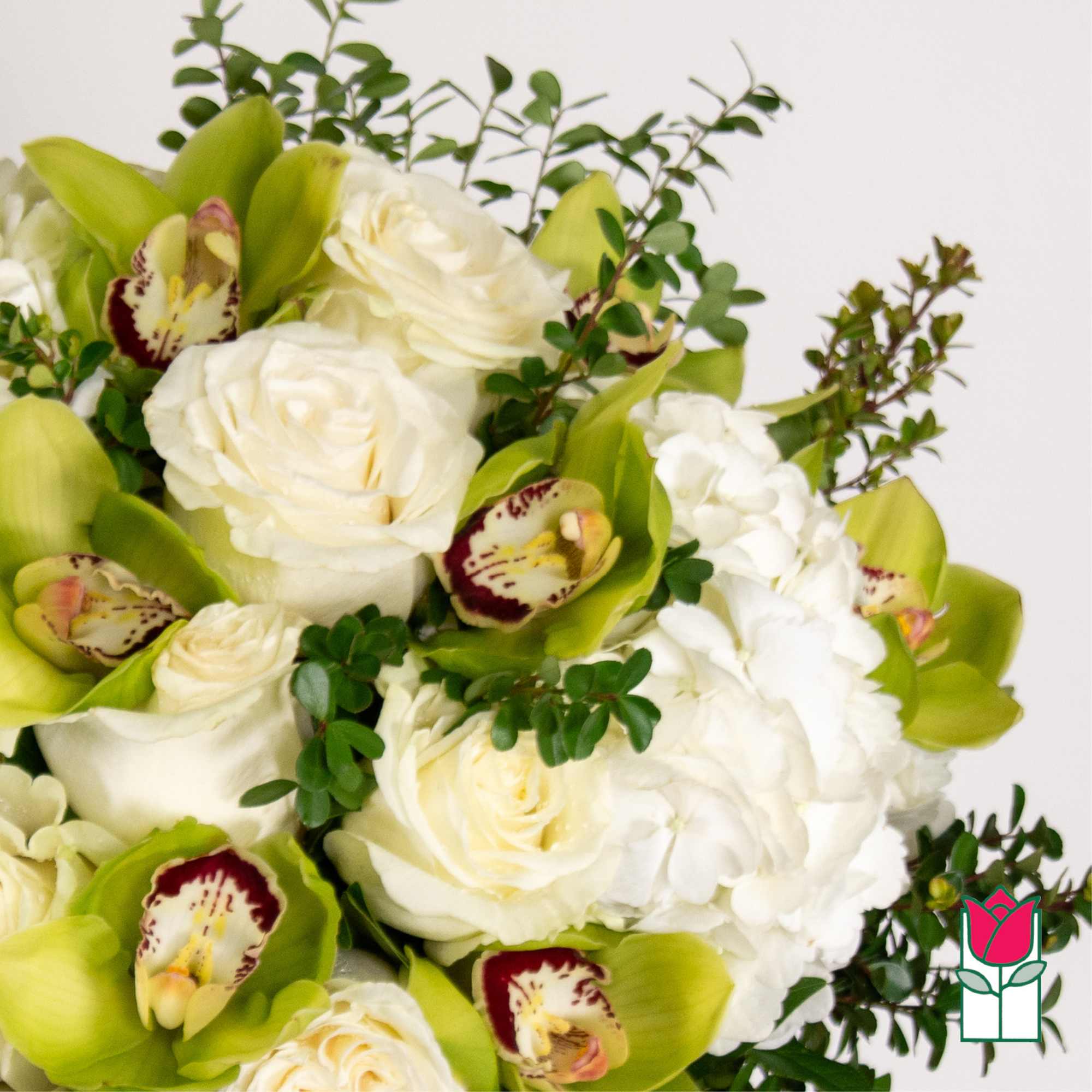 Elevate your space with the Beretania Florist Compact Bouquet, a charming floral