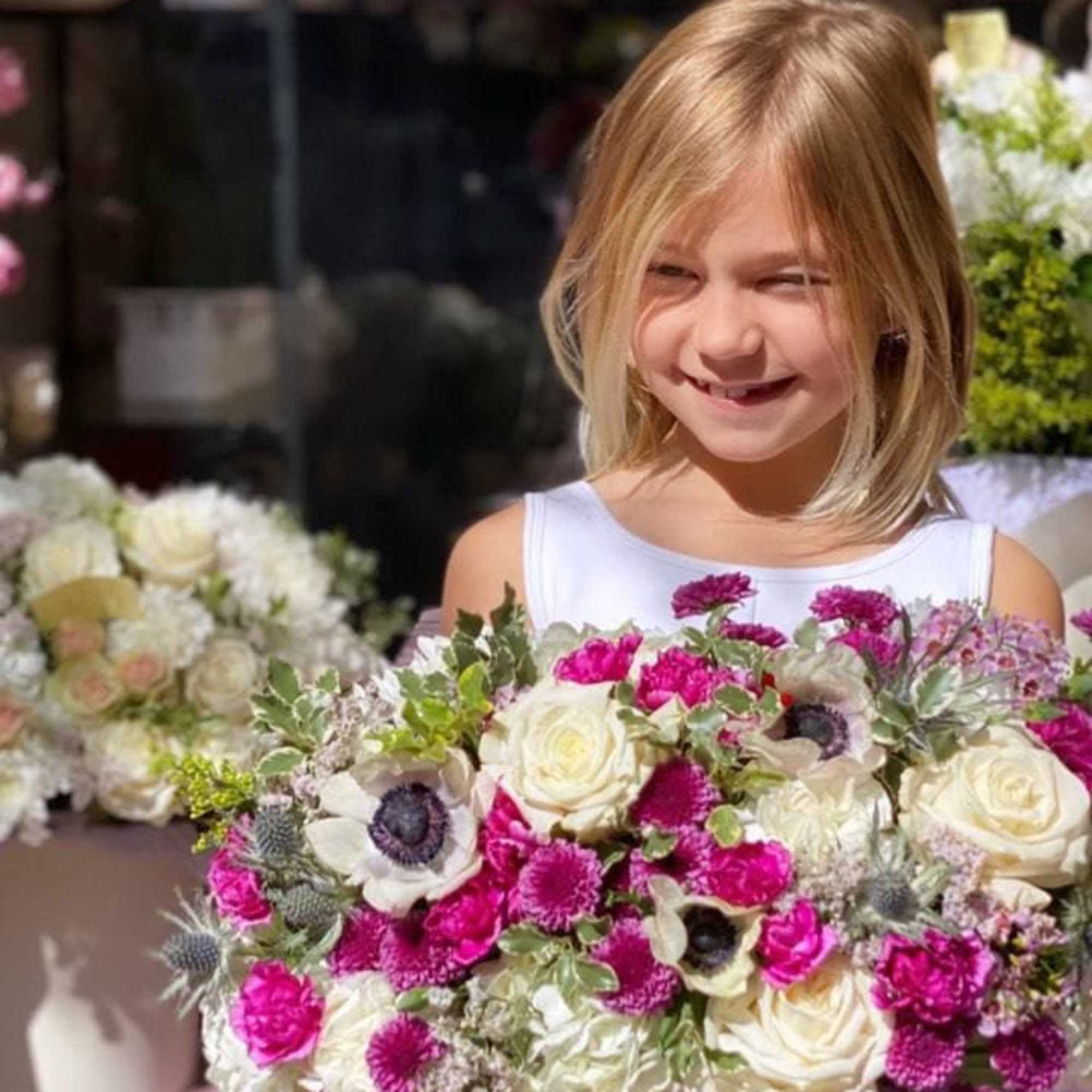 Loli is a sunning arrangement of garden roses, carnations and eryngium flowers