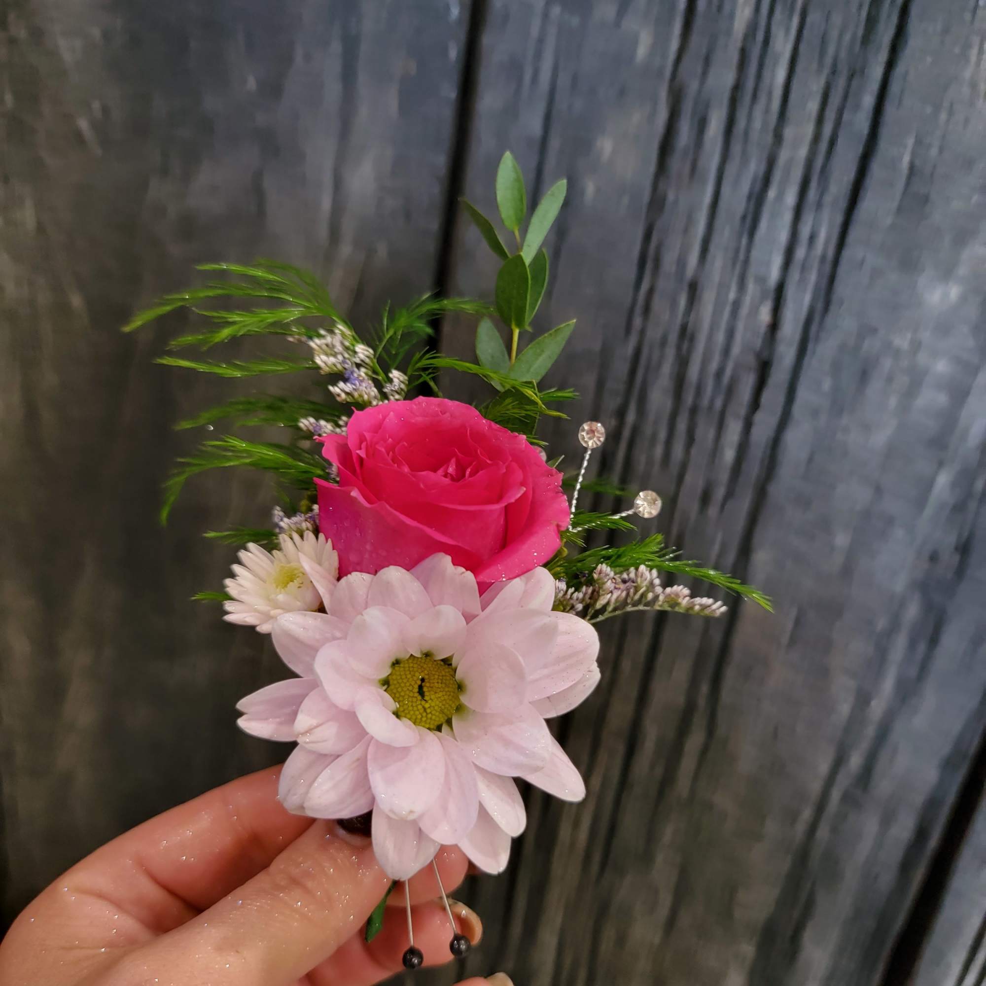 A beautiful Boutinere made in any color choice and flower type. 
Availabe