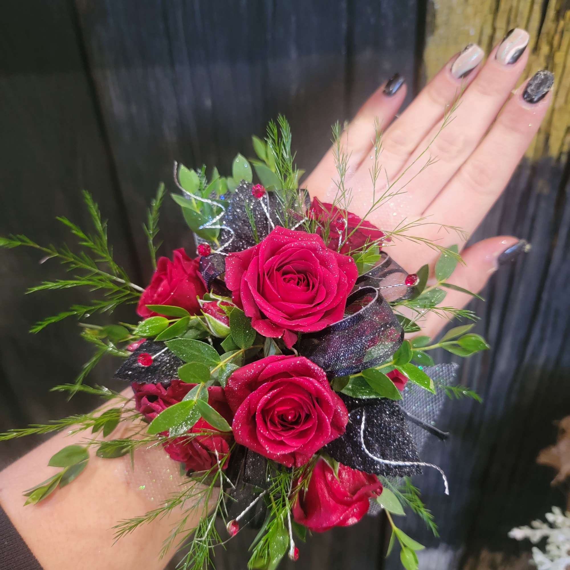 A beautiful red corsage made with your choice of flowers. 
Options include:
