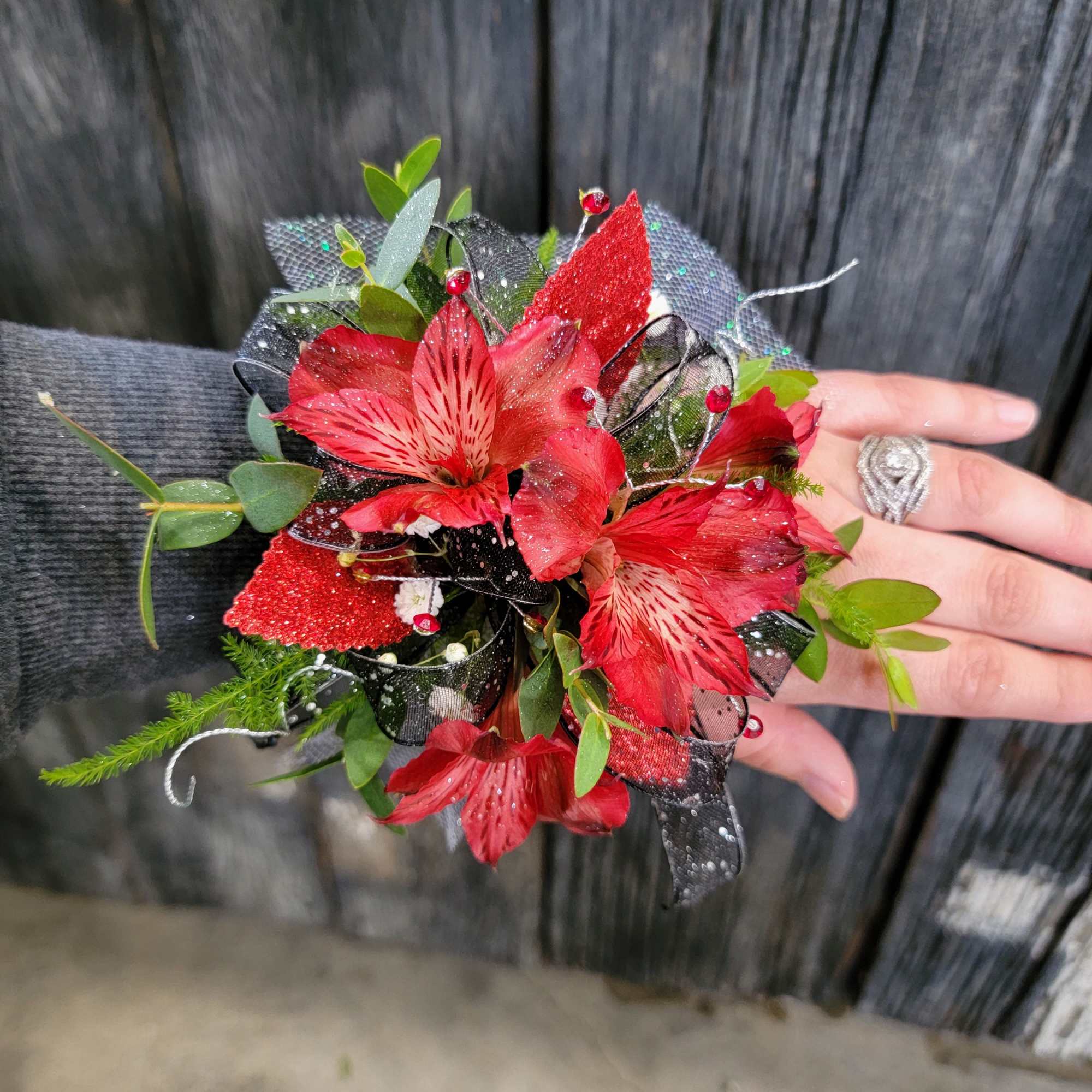 A beautiful red corsage made with your choice of flowers. 
Options include: