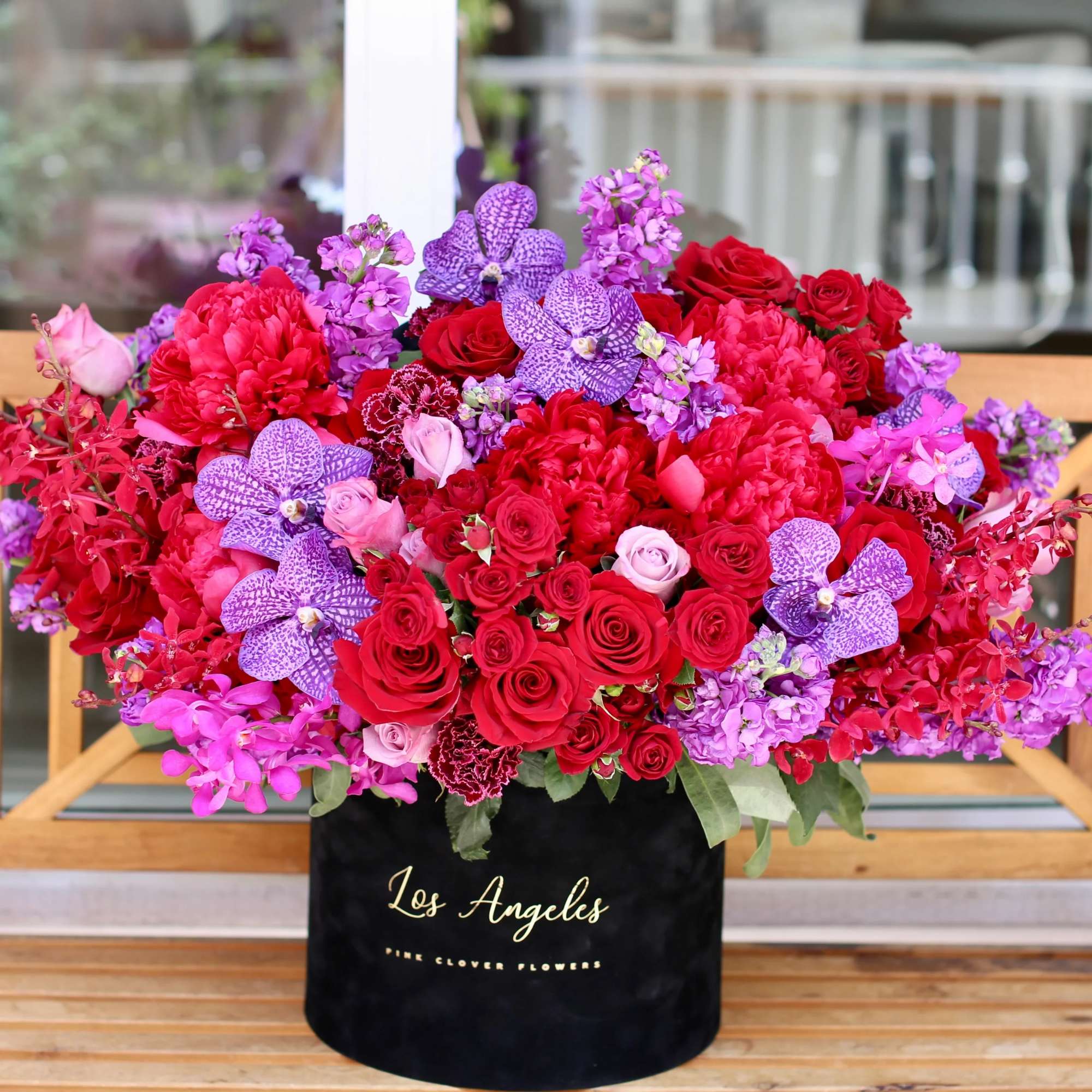 Huge box with res roses, peonies, garden roses and three different types