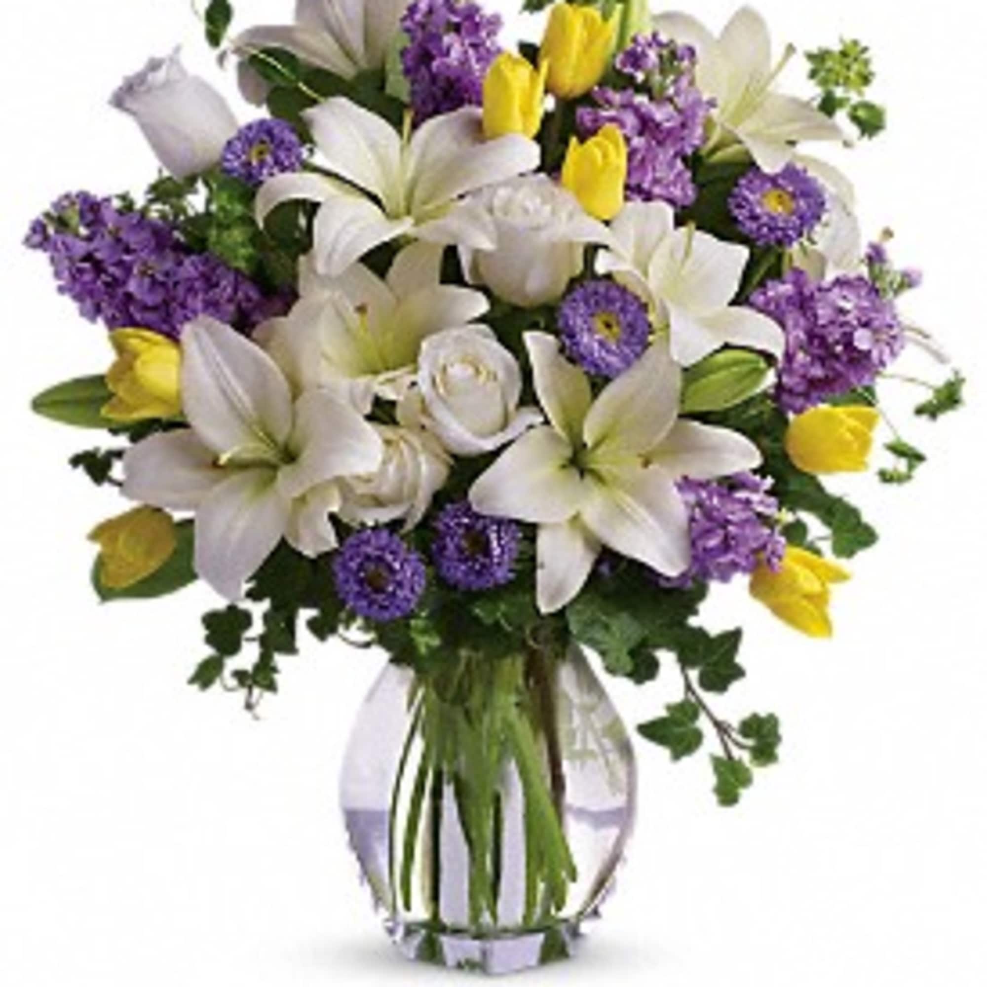 Dance into spring! Send this feminine bouquet of favorite spring flowers to Dance into spring! Send this feminine bouquet of favorite spring flowers to