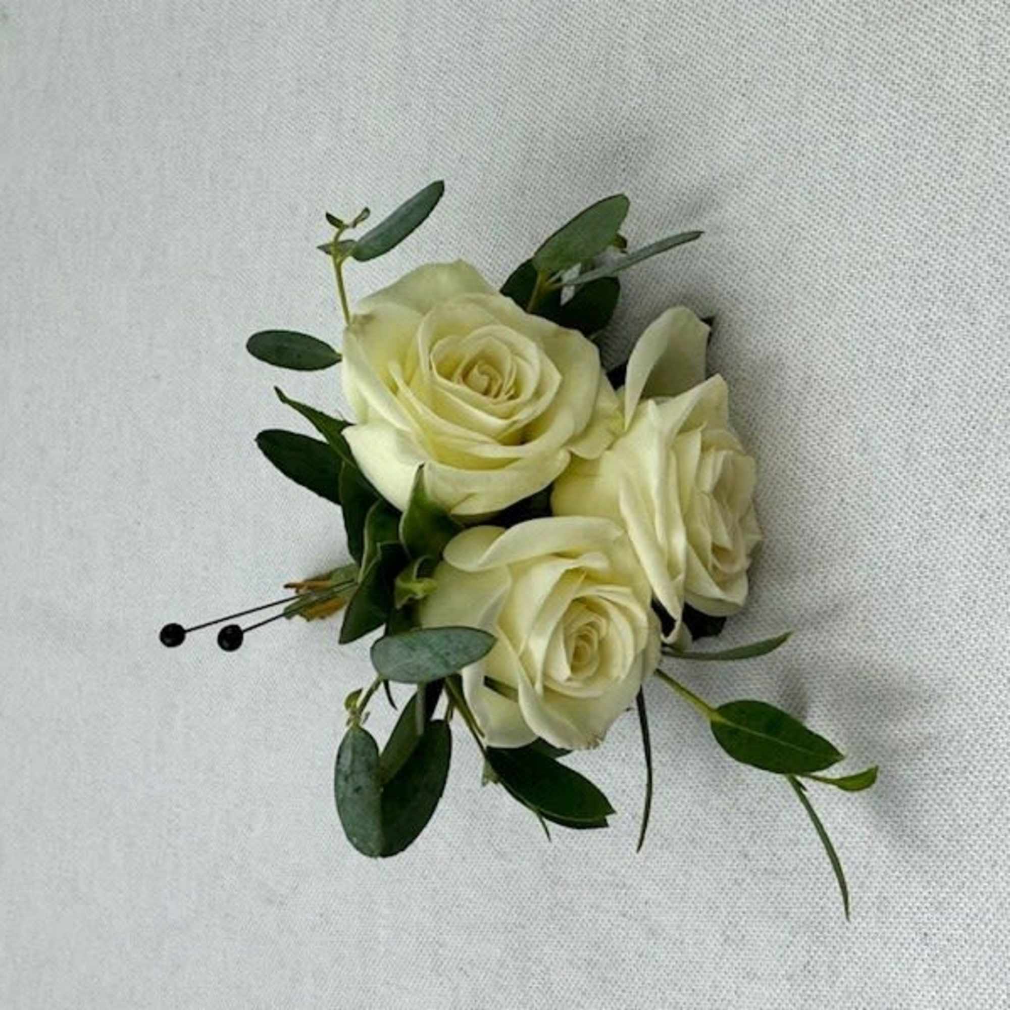 White spray roses, eucalyptus