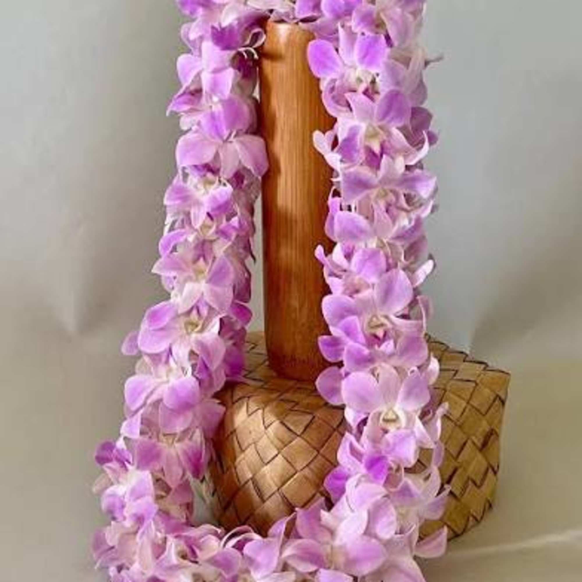 Beautiful graduation or any special location Lay with lavender orchids