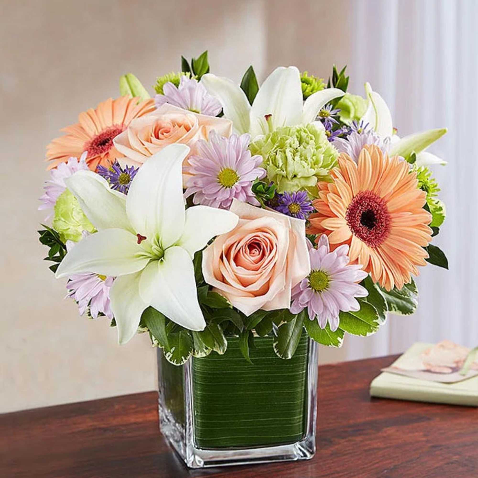 Soothe an aching heart with a sentimental tribute in soft, delicate shades.