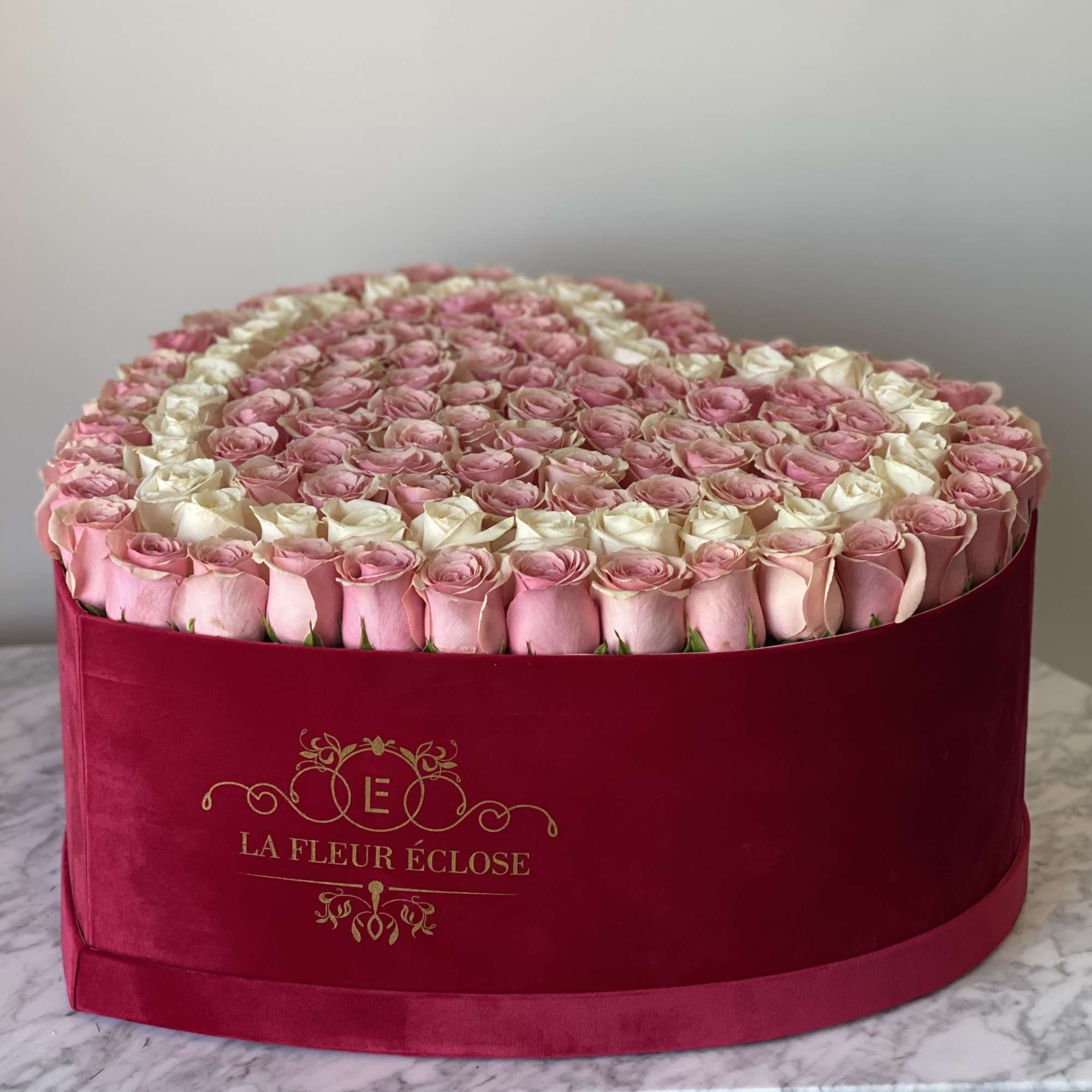 Fresh Cut Roses!!!
120 Geraldine and white roses in our signature red heart Fresh Cut Roses!!!
120 Geraldine and white roses in our signature red heart