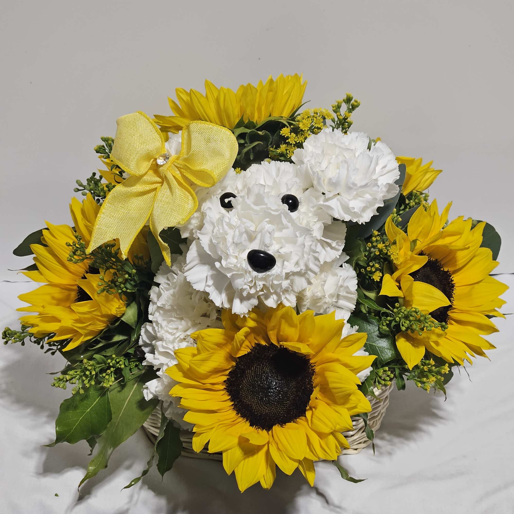  Bark up the right tree for this loveable floral gift. --