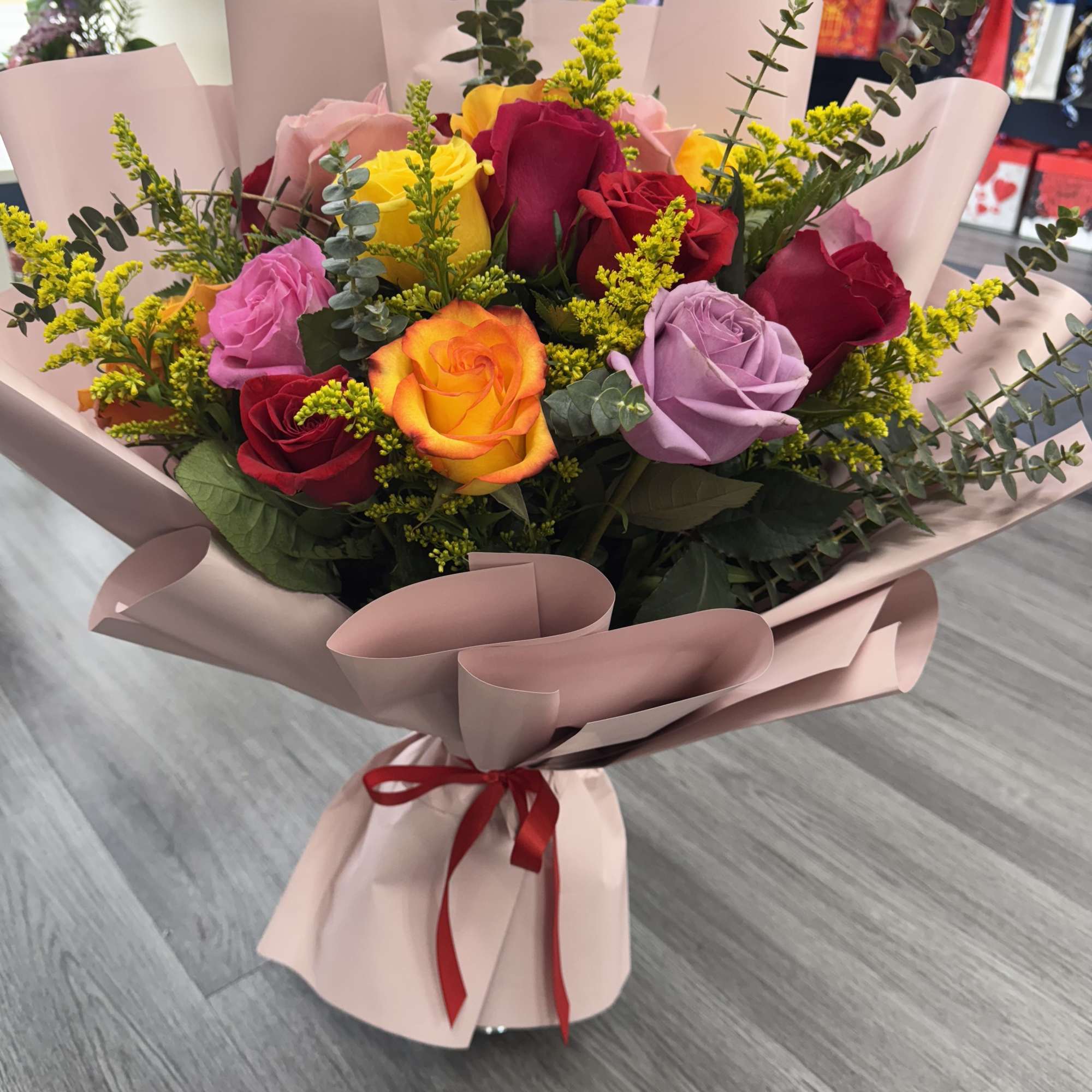 Brighten any occasion with our stunning Mix Roses bouquet. This vibrant arrangement