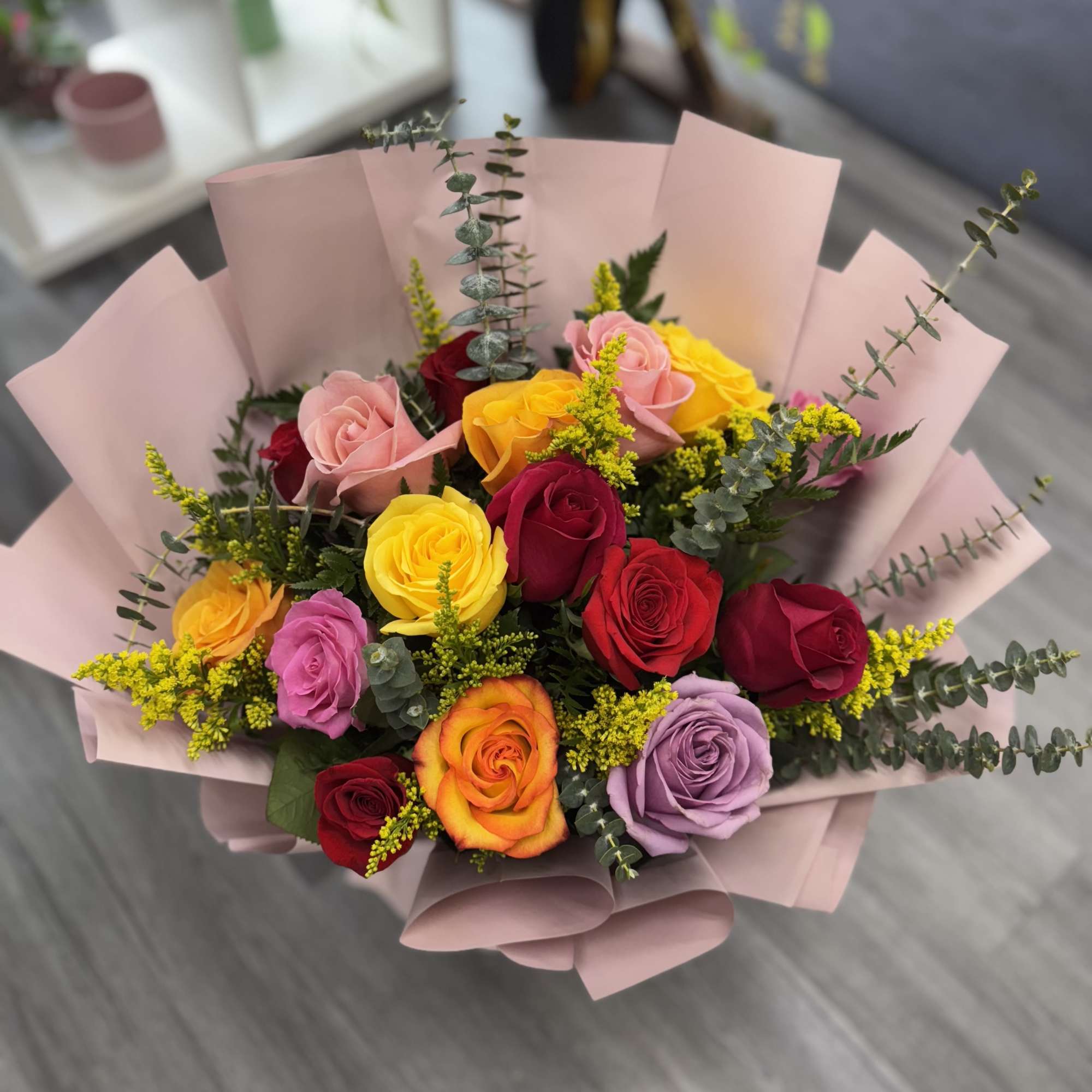 Brighten any occasion with our stunning Mix Roses bouquet. This vibrant arrangement