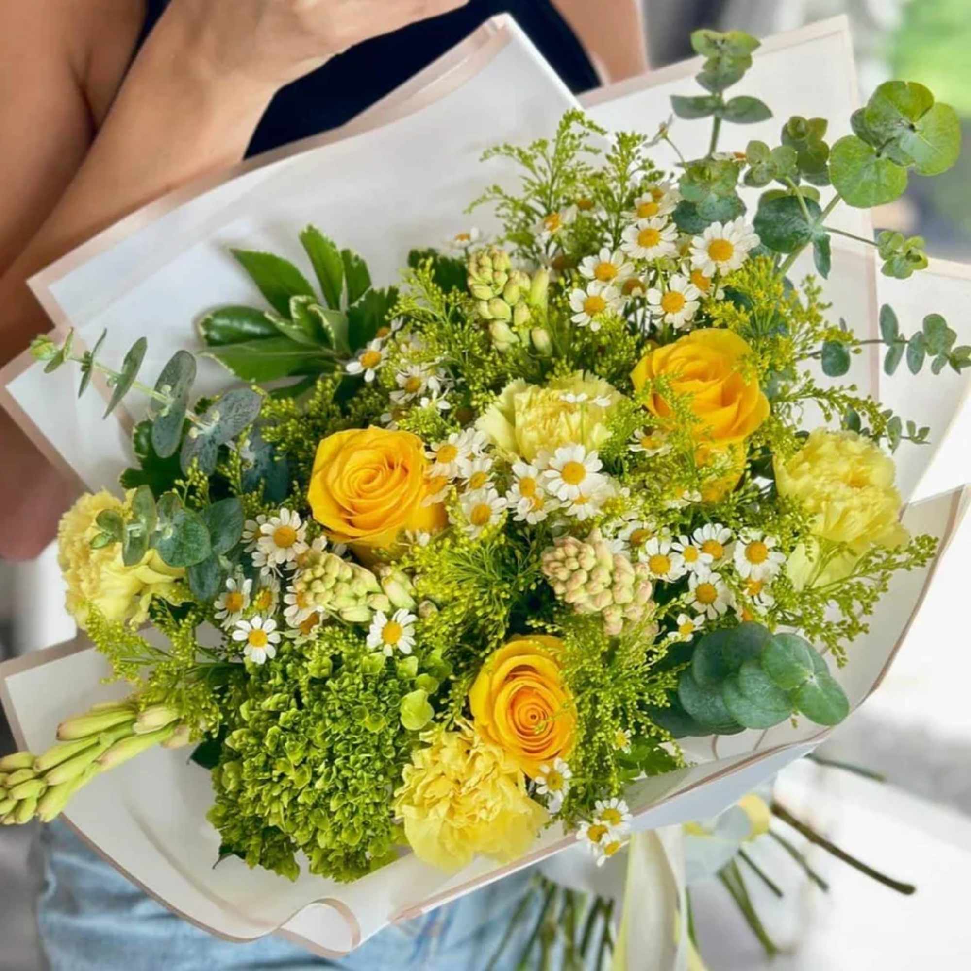 The Sunny Day Bouquet combines the cheerful beauty of yellow roses with