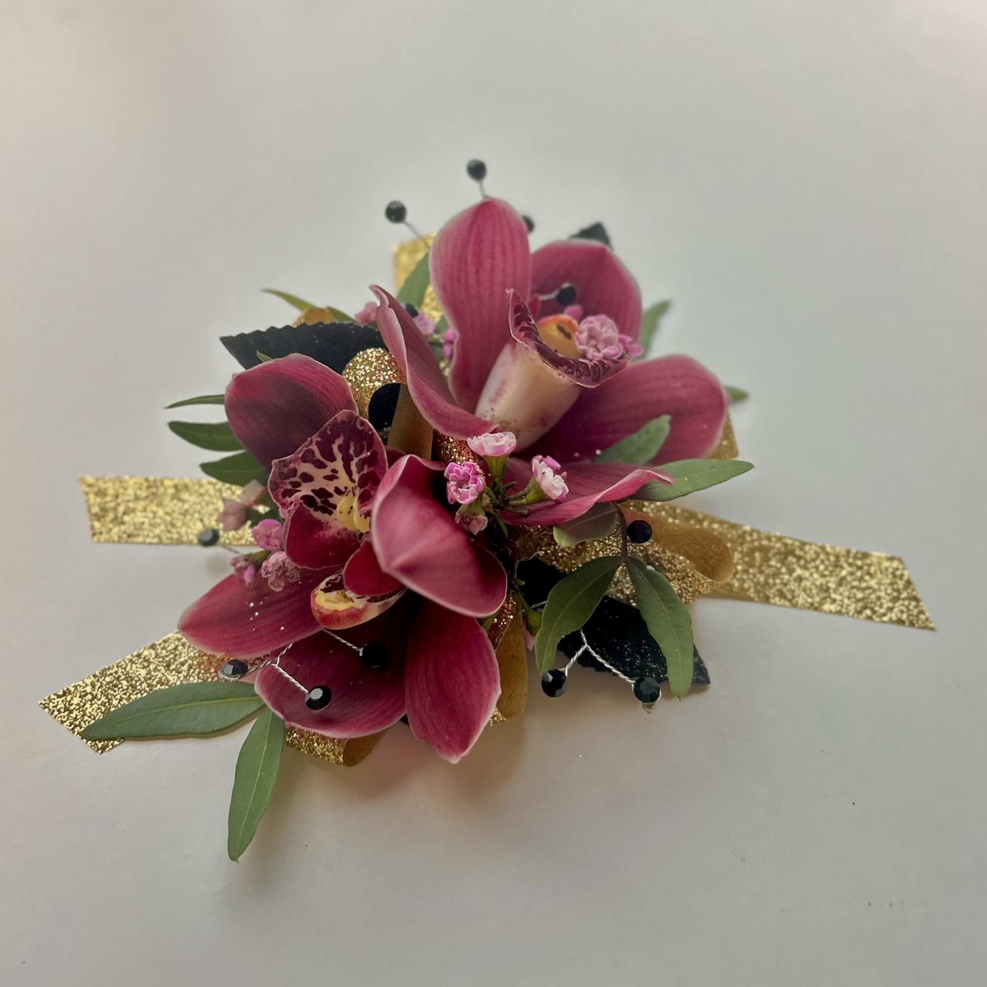 A beautiful Mini Cymbidium Orchid Corsage for Prom or Homecoming girls. 