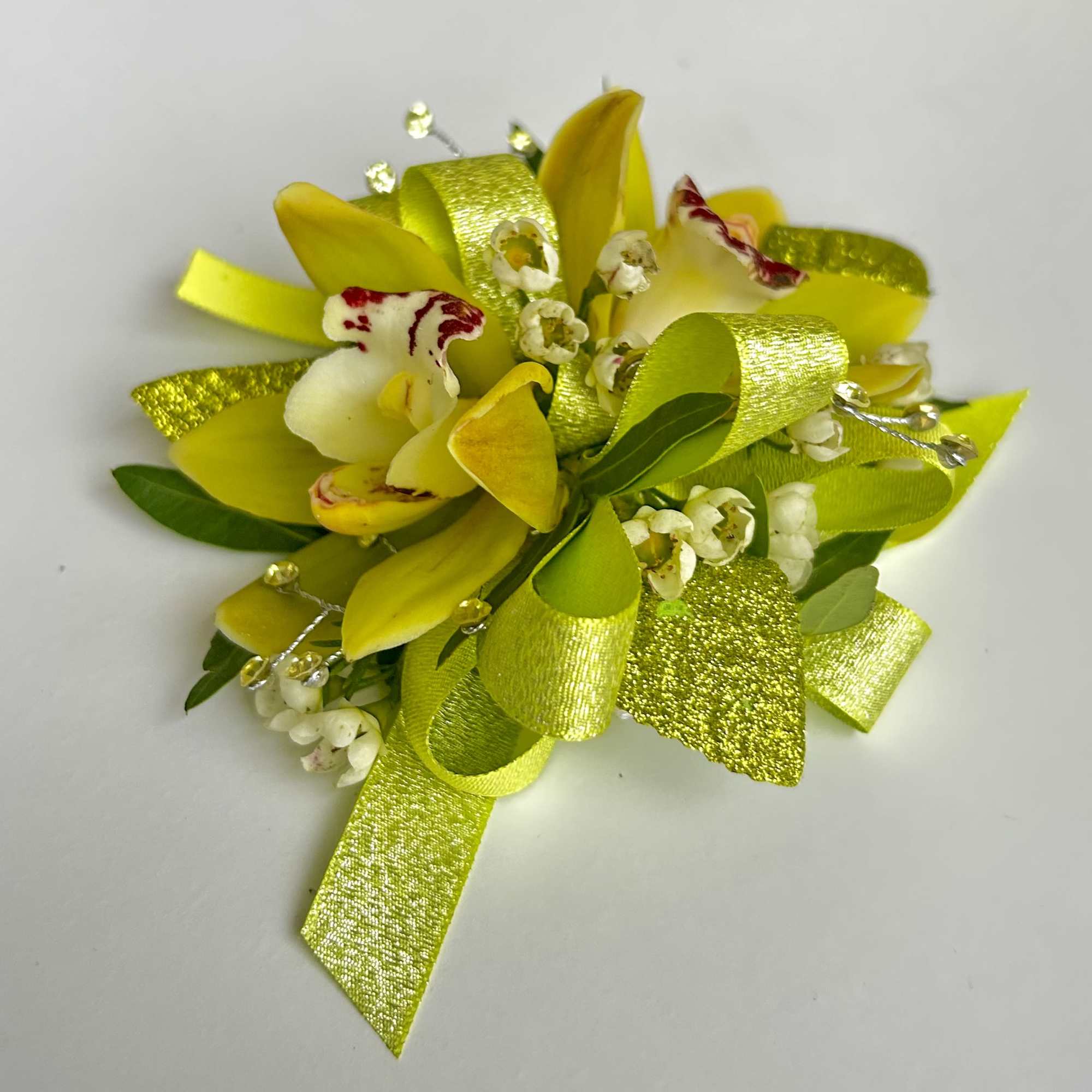A beautiful Mini Cymbidium Orchid Corsage for Prom or Homecoming girls. 
