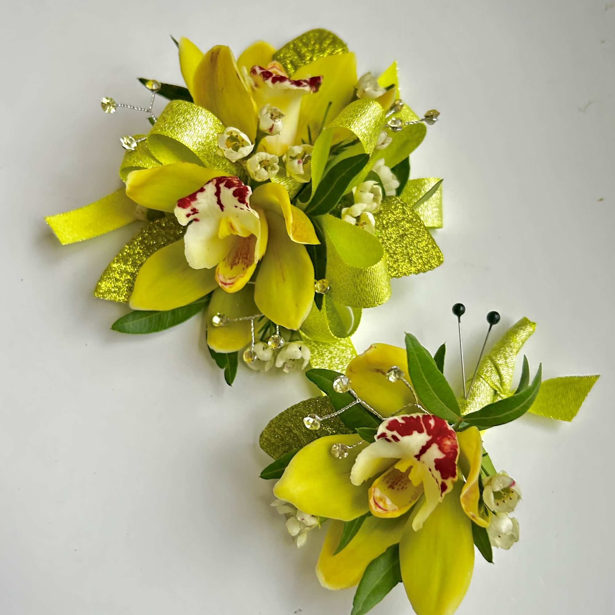 A beautiful Mini Cymbidium Orchid Corsage for Prom or Homecoming girls. 