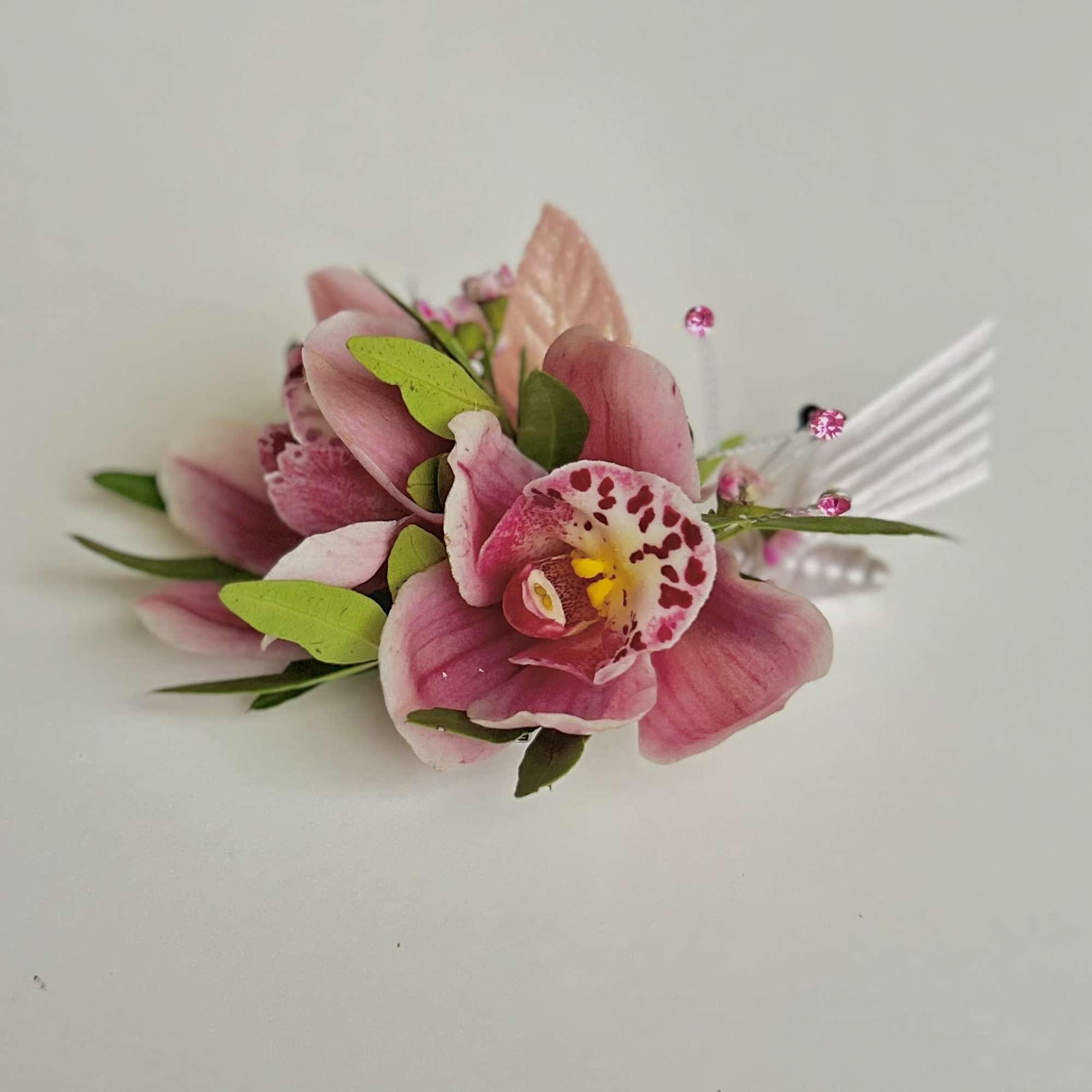 A beautiful Mini Cymbidium Orchid Corsage for Prom or Homecoming boys.