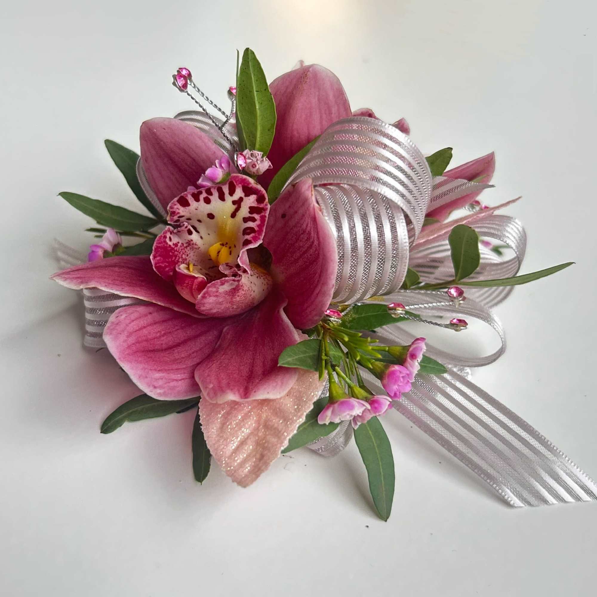 A beautiful Mini Cymbidium Orchid Corsage for Prom or Homecoming girls. 
