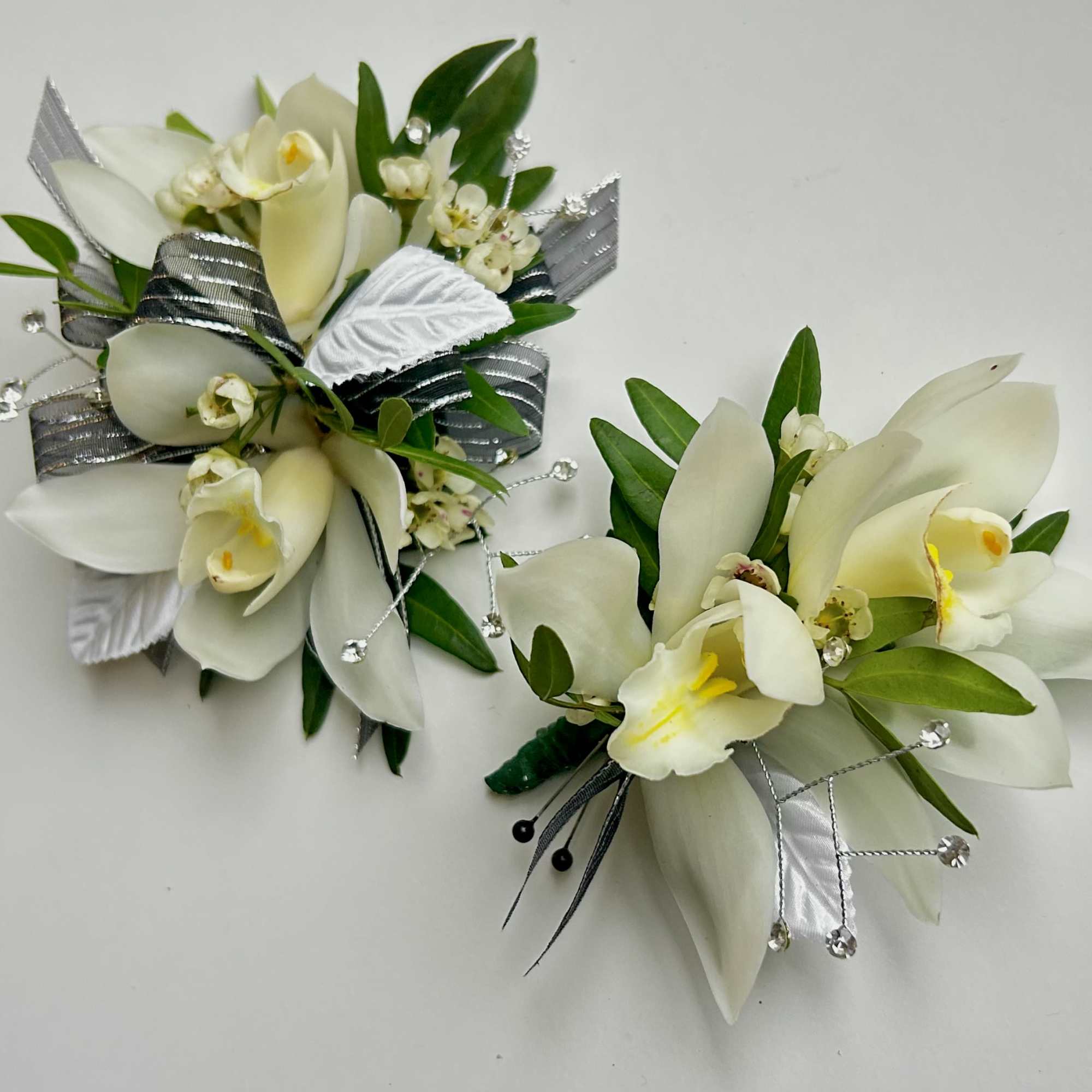 A beautiful Mini Cymbidium Orchid Corsage for Prom or Homecoming boys.