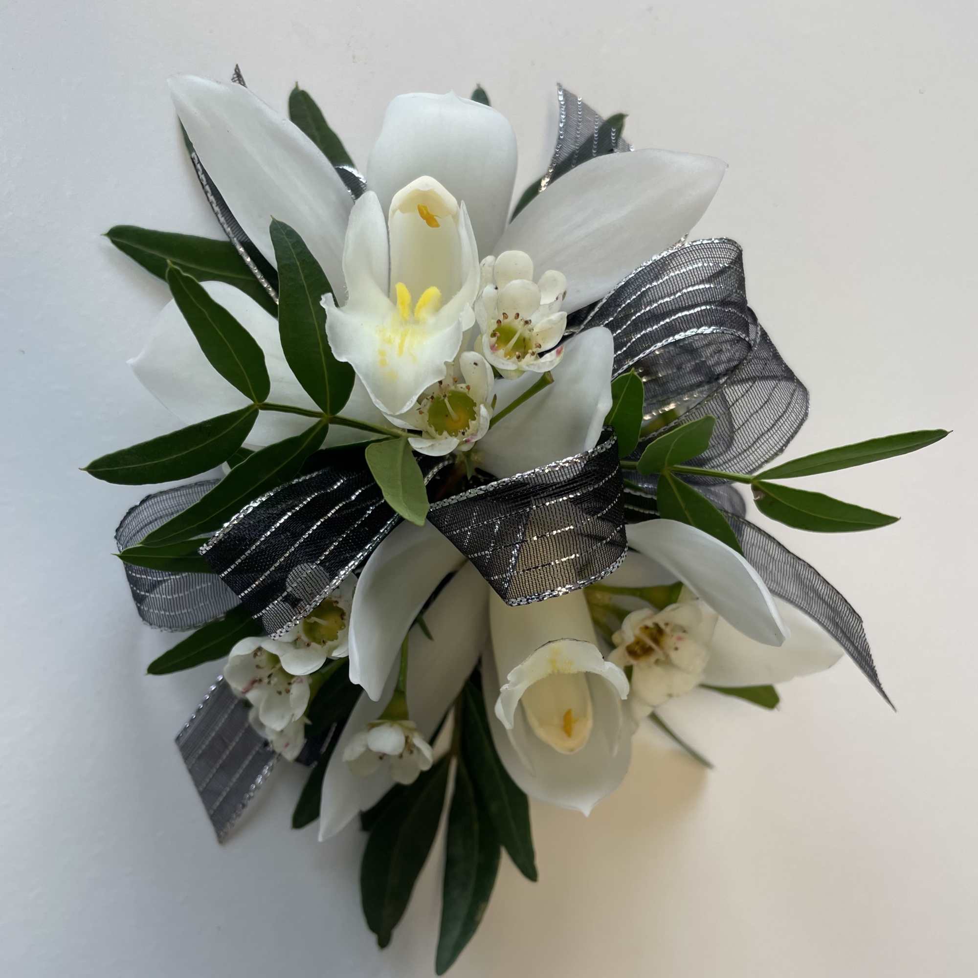 A beautiful Mini Cymbidium Orchid Corsage for Prom or Homecoming girls. 