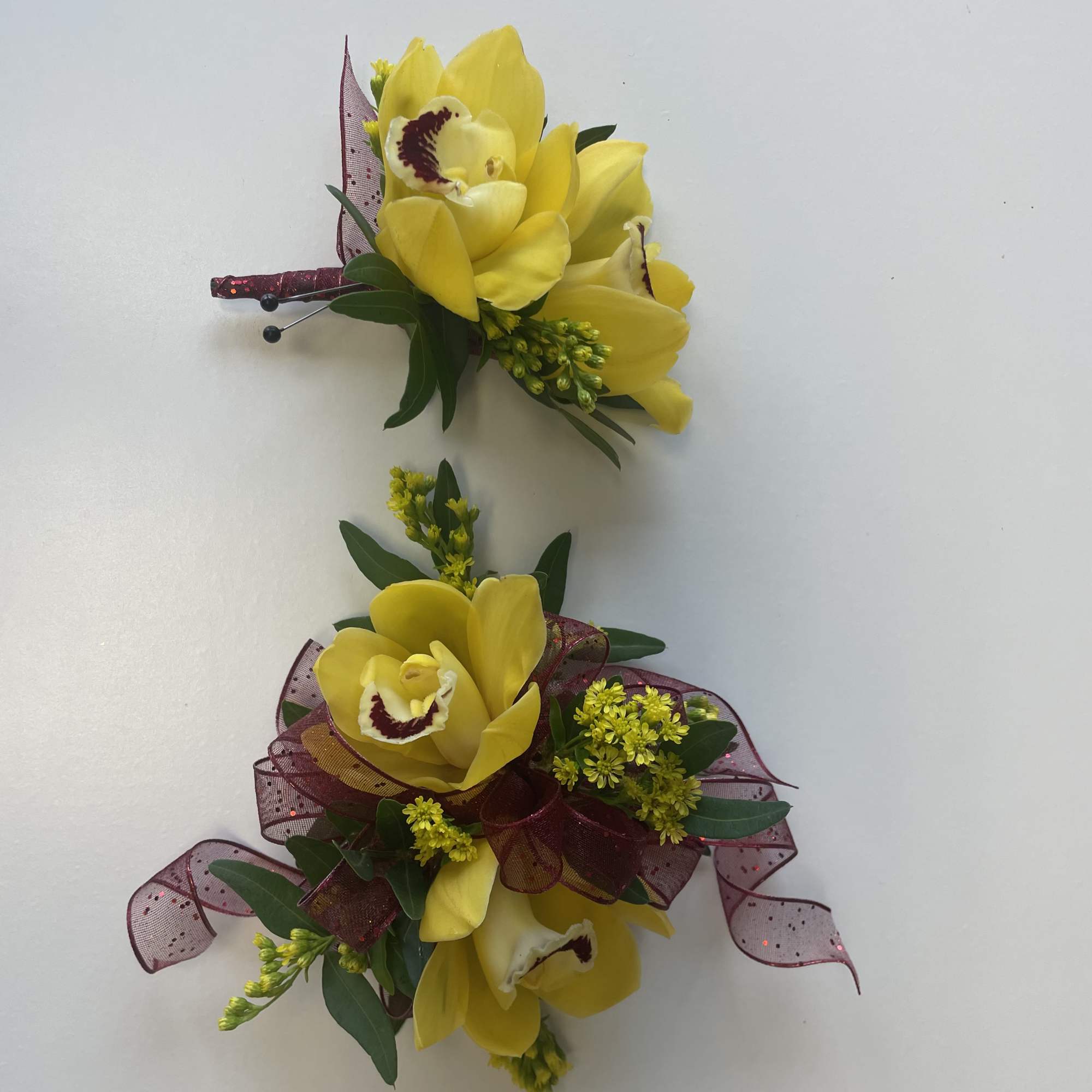 A beautiful Mini Cymbidium Orchid Corsage for Prom or Homecoming boys.