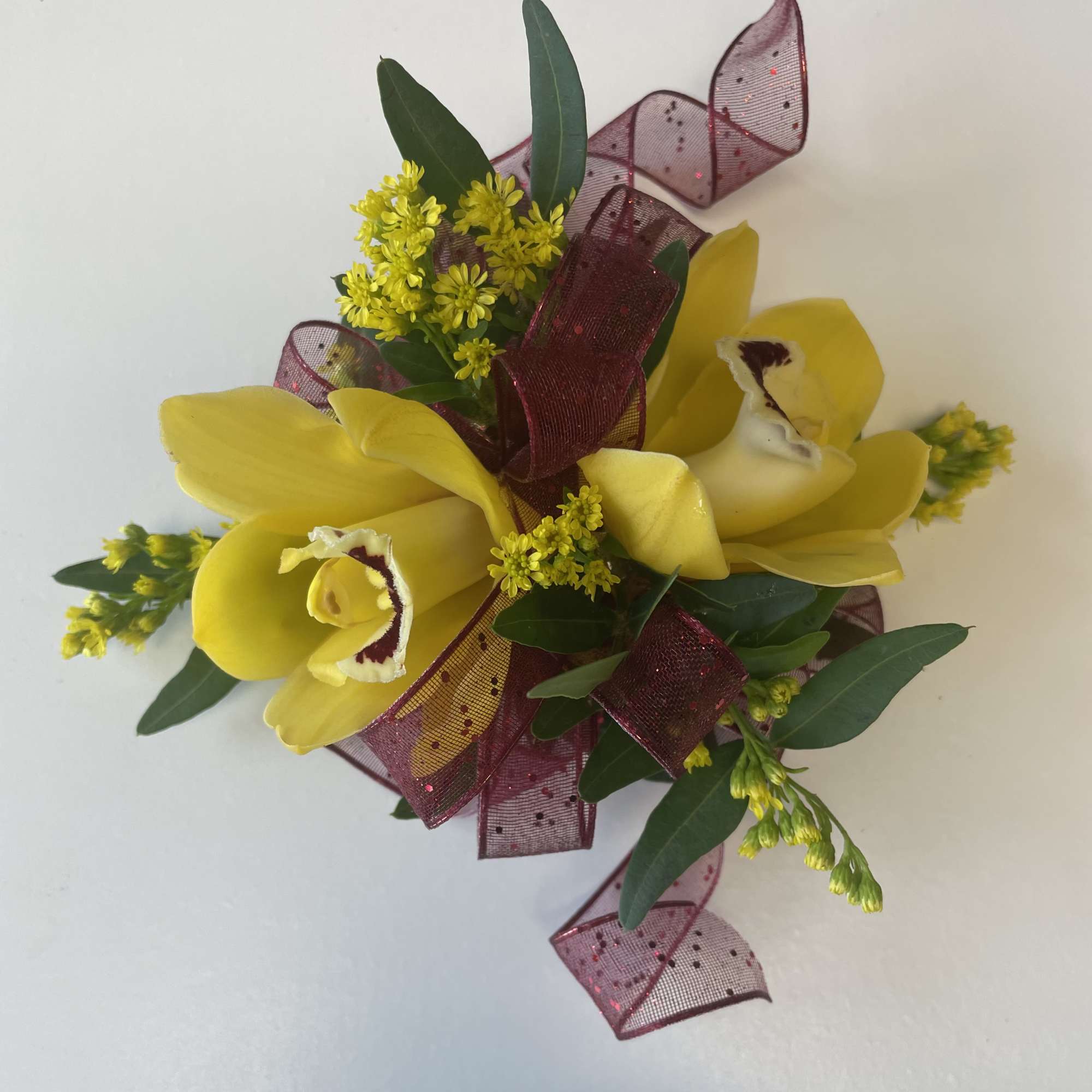 A beautiful Mini Cymbidium Orchid Corsage for Prom or Homecoming girls. 