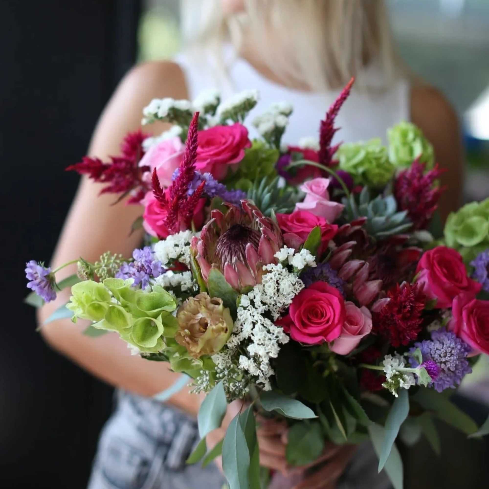 The best exotic bouquet&#039;s made of roses, proteas, succulents, eucalyptus, statice bloom