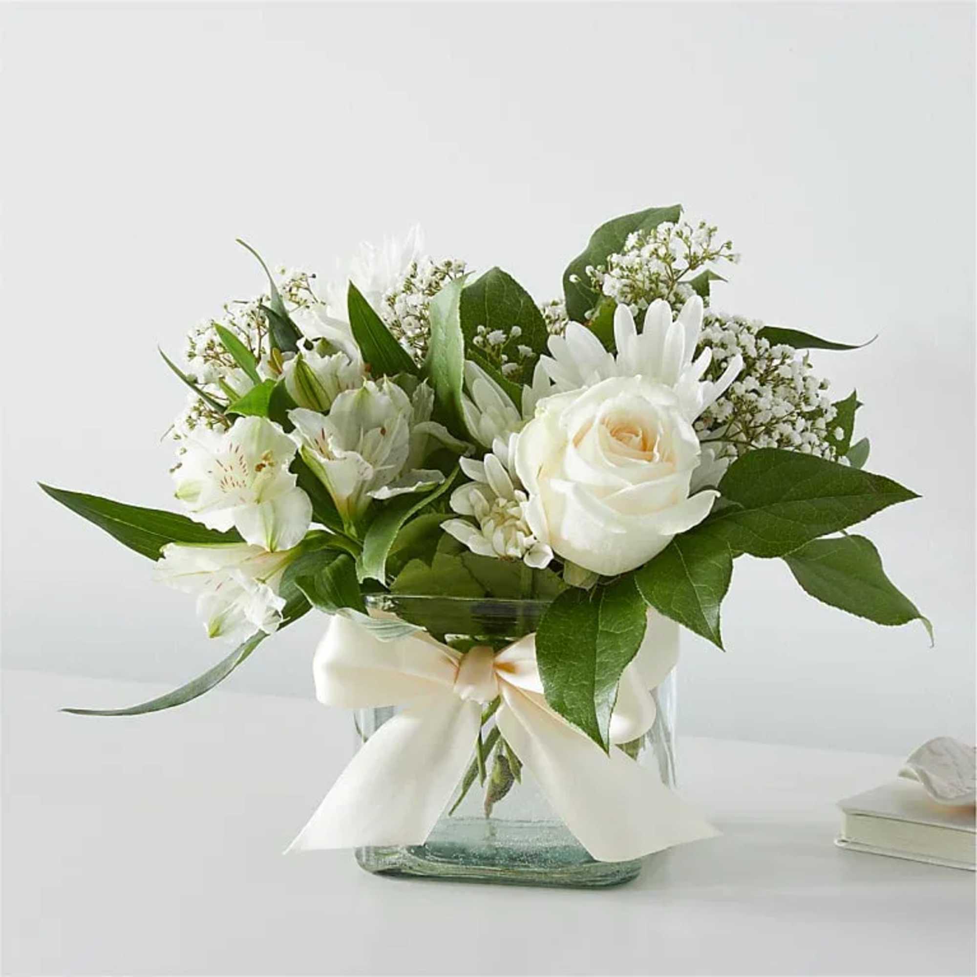 These elegant bright blooms are designed to celebrate the beauty of life.
Comes