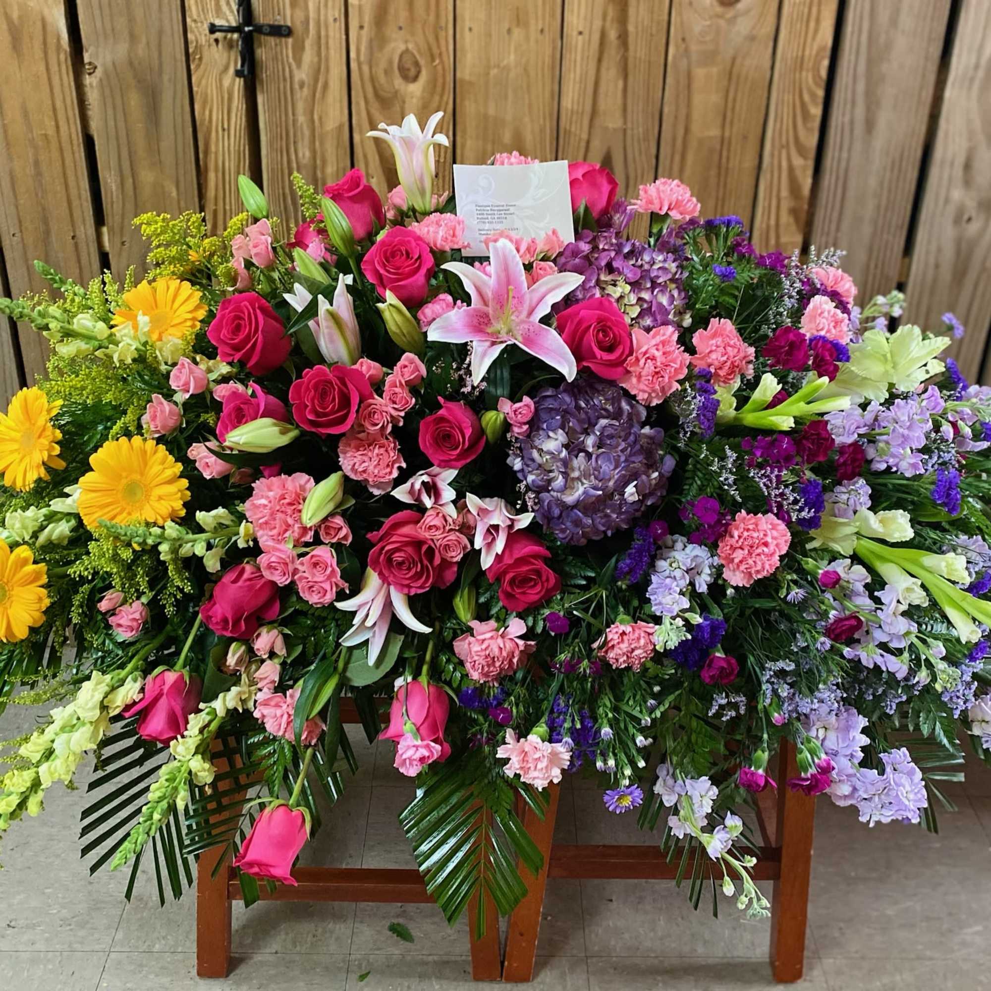 Honor a bright, beautiful life with this colorful burst of hydrangea, roses Honor a bright, beautiful life with this colorful burst of hydrangea, roses