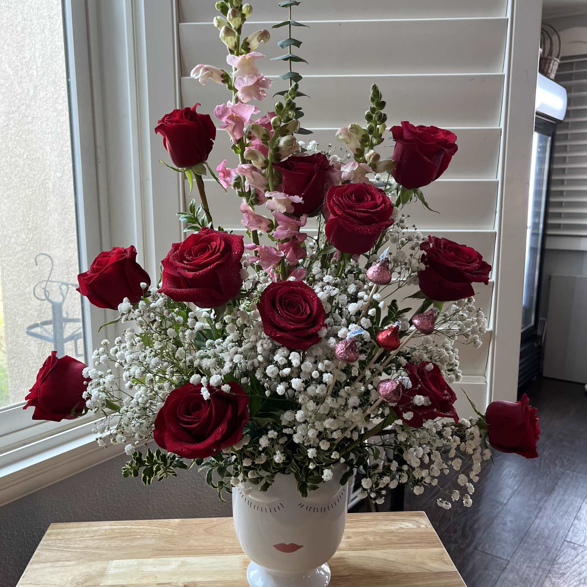 1 dozen roses, Hershey kisses, pink snapdragons 