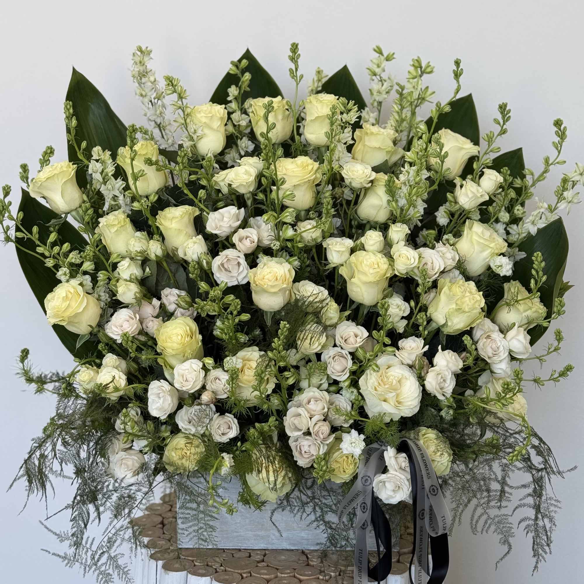 Our Tranquil Heart Floral Tribute is a graceful tribute featuring elegant white
