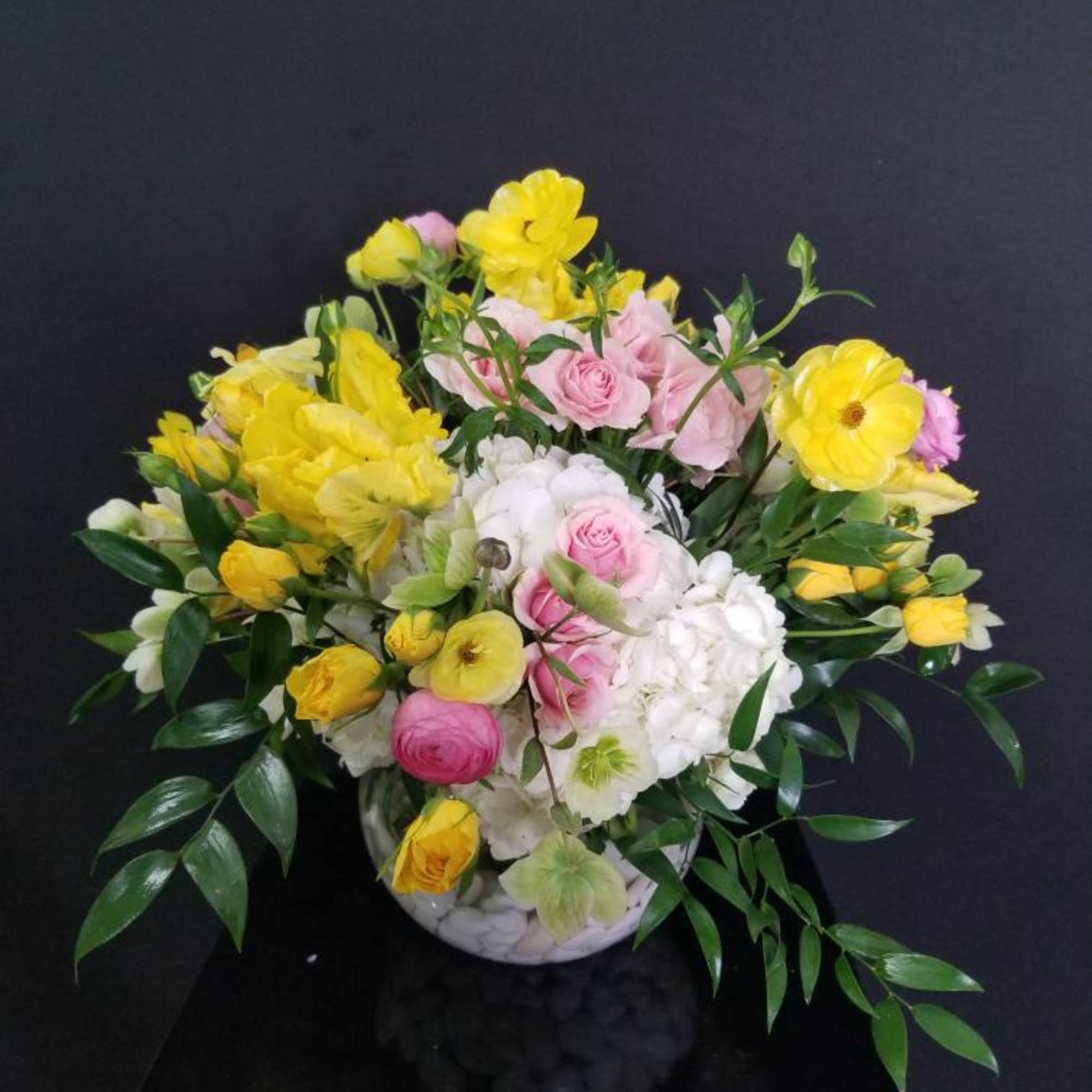 The beauty of double tulips and the softness of butterfly ranunculus give The beauty of double tulips and the softness of butterfly ranunculus give