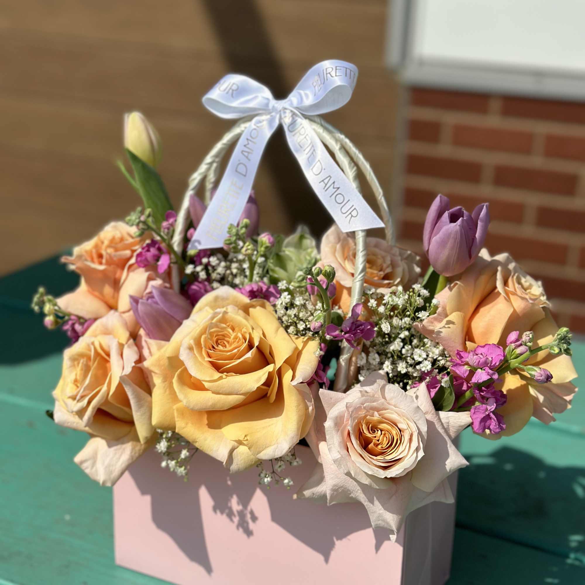 Introducing our &quot;Pink Floral Clutch,&quot; a delightful accessory adorned with an array