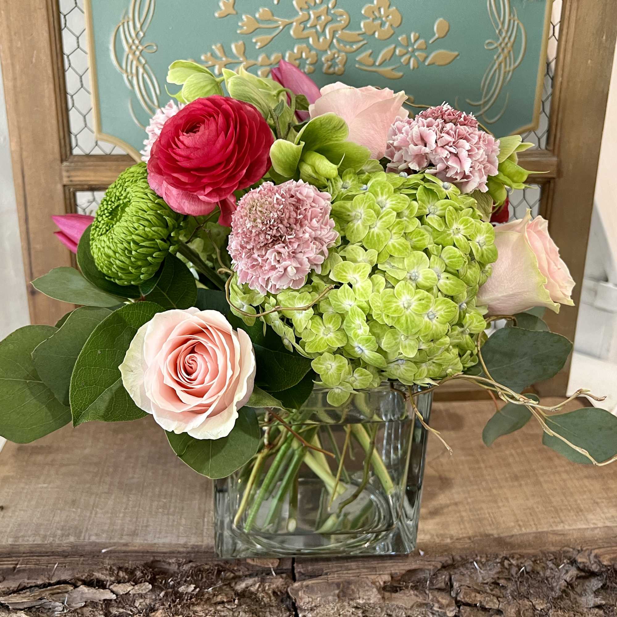 A stunning combination of hydrangeas, roses, tulips, scabiosa, ranunculus and cremone with
