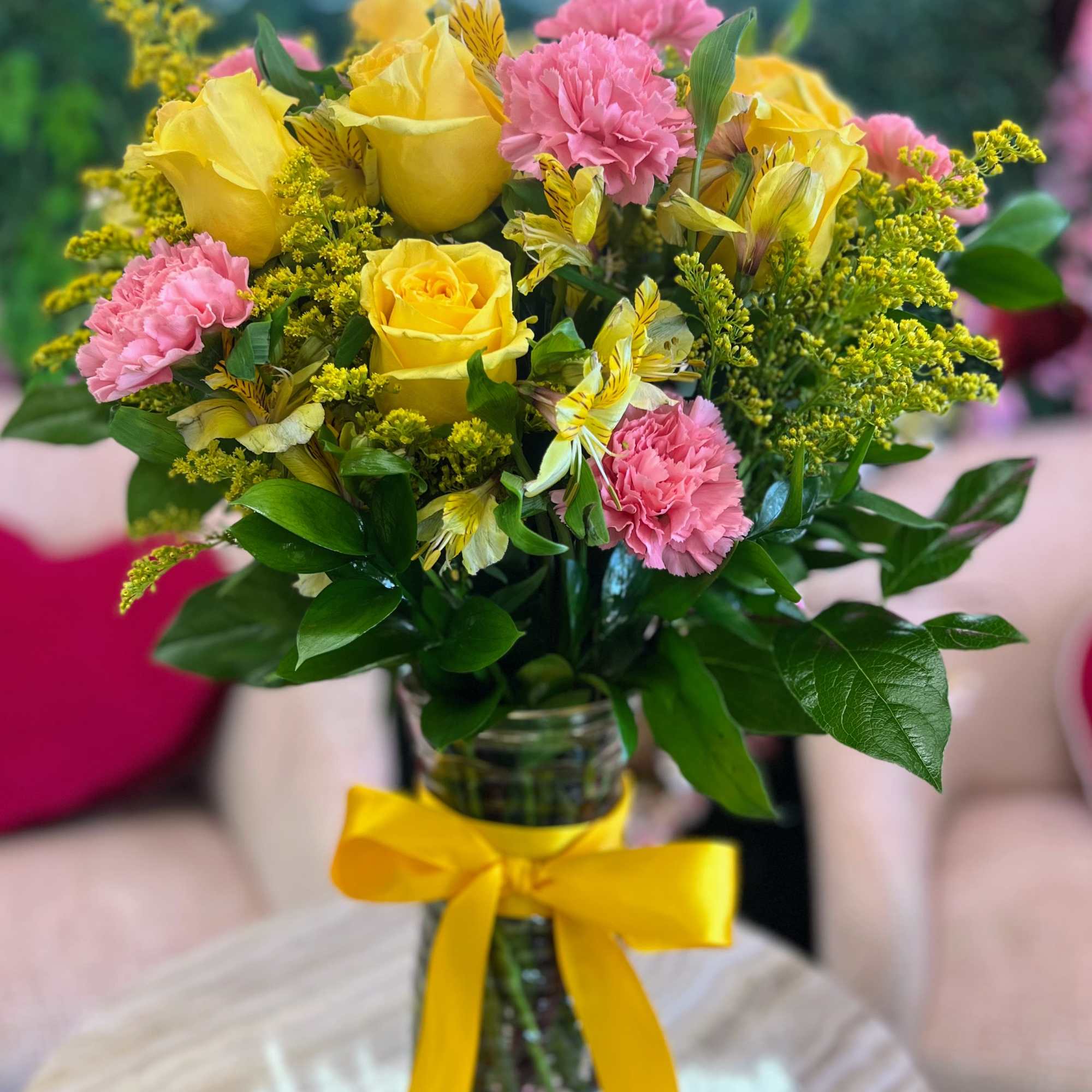 A cheerful blend of sunny yellow and soft pink blooms, our Lemon