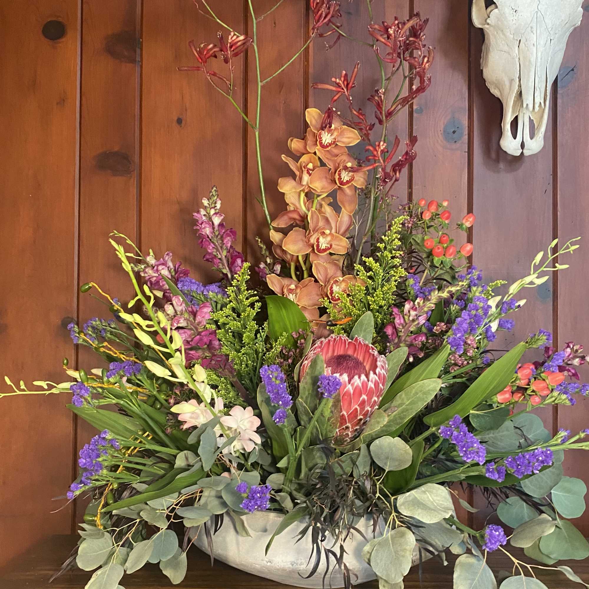 A overwhelmingly large display of beautiful fresh cut flowers arranged in a