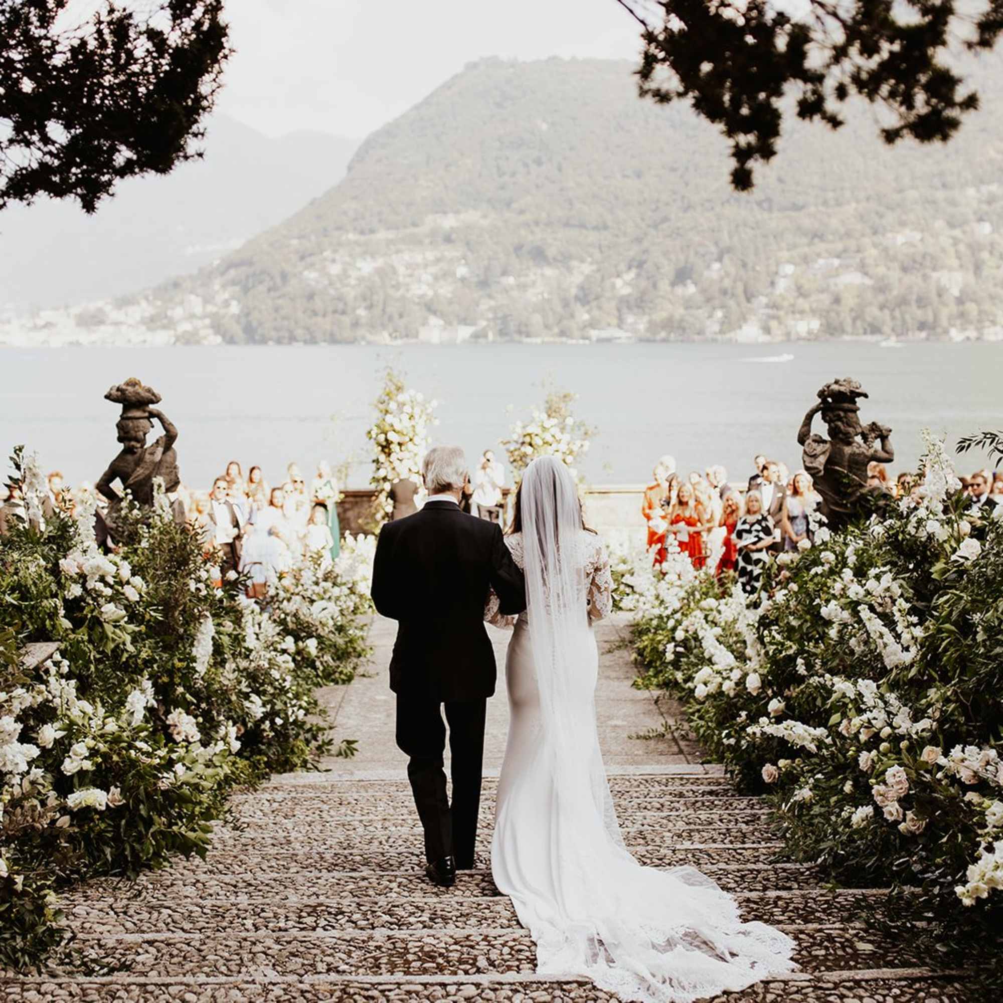 This Italian wedding floral package includes $3000 of fresh cut flowers, 8000