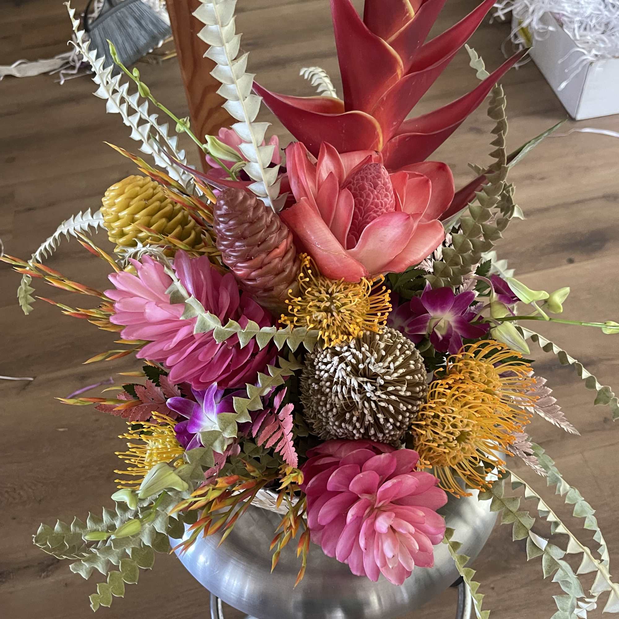  This floral package includes two large tropical floral towers and one