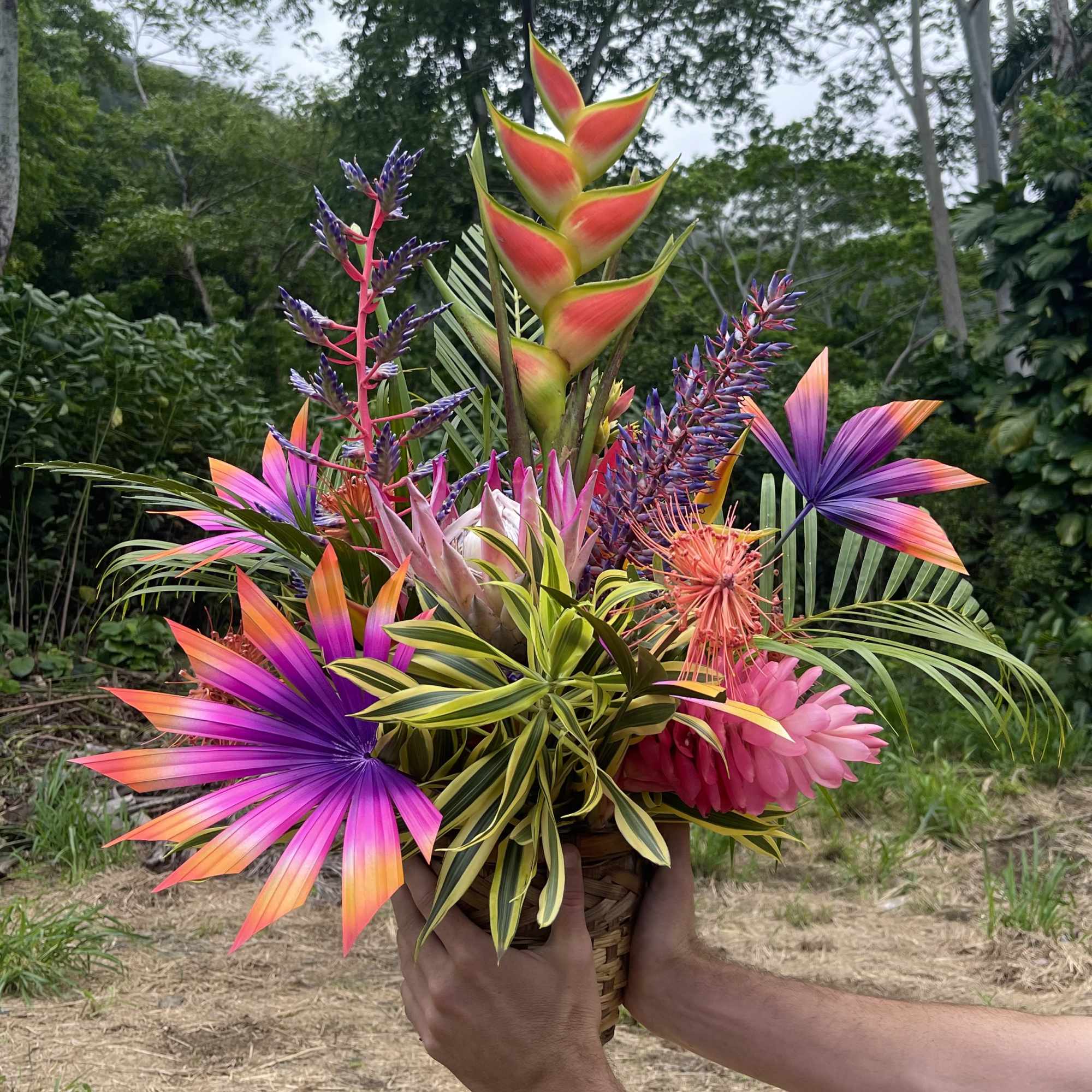  This floral package includes two large tropical floral towers and one