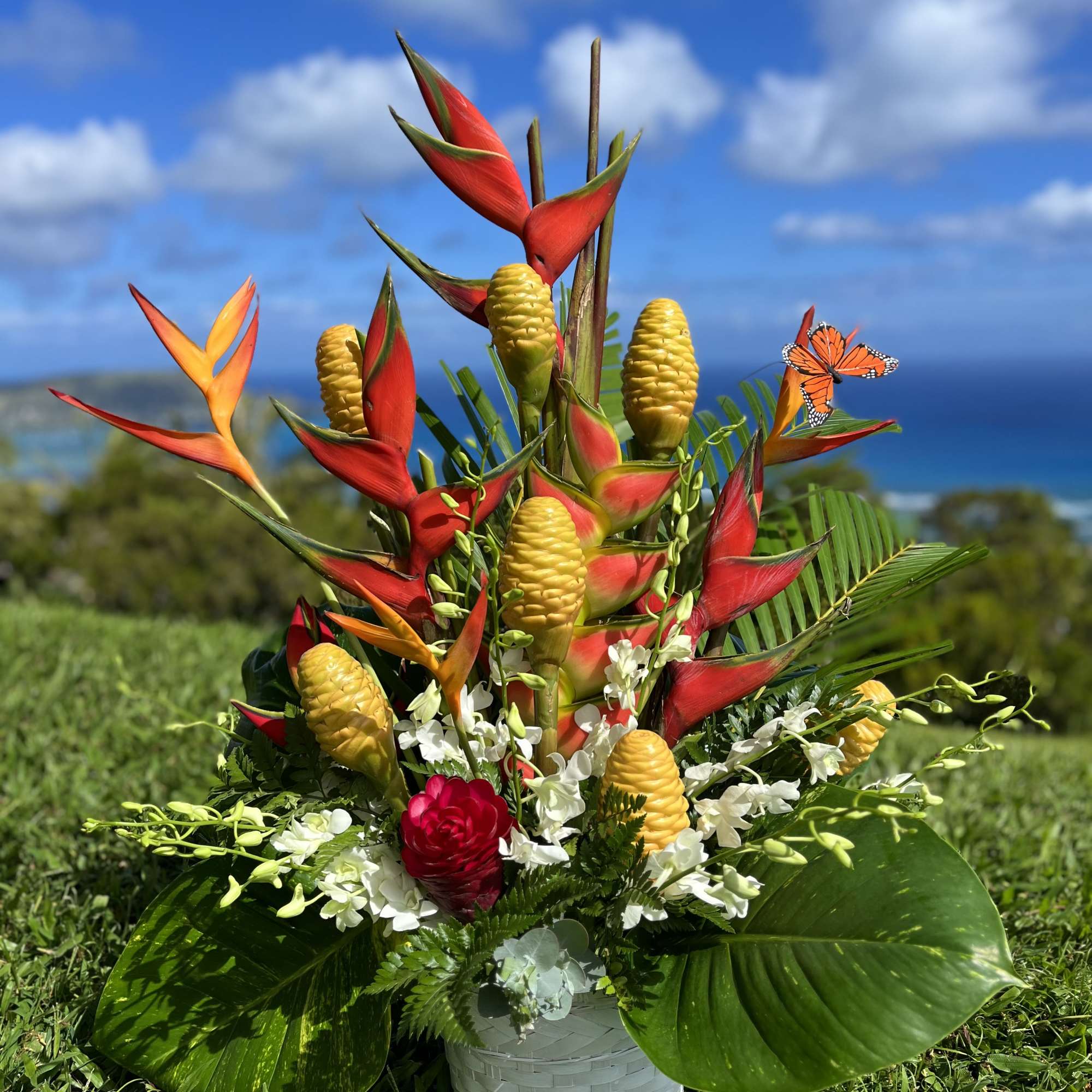  This floral package includes two large tropical floral towers and one
