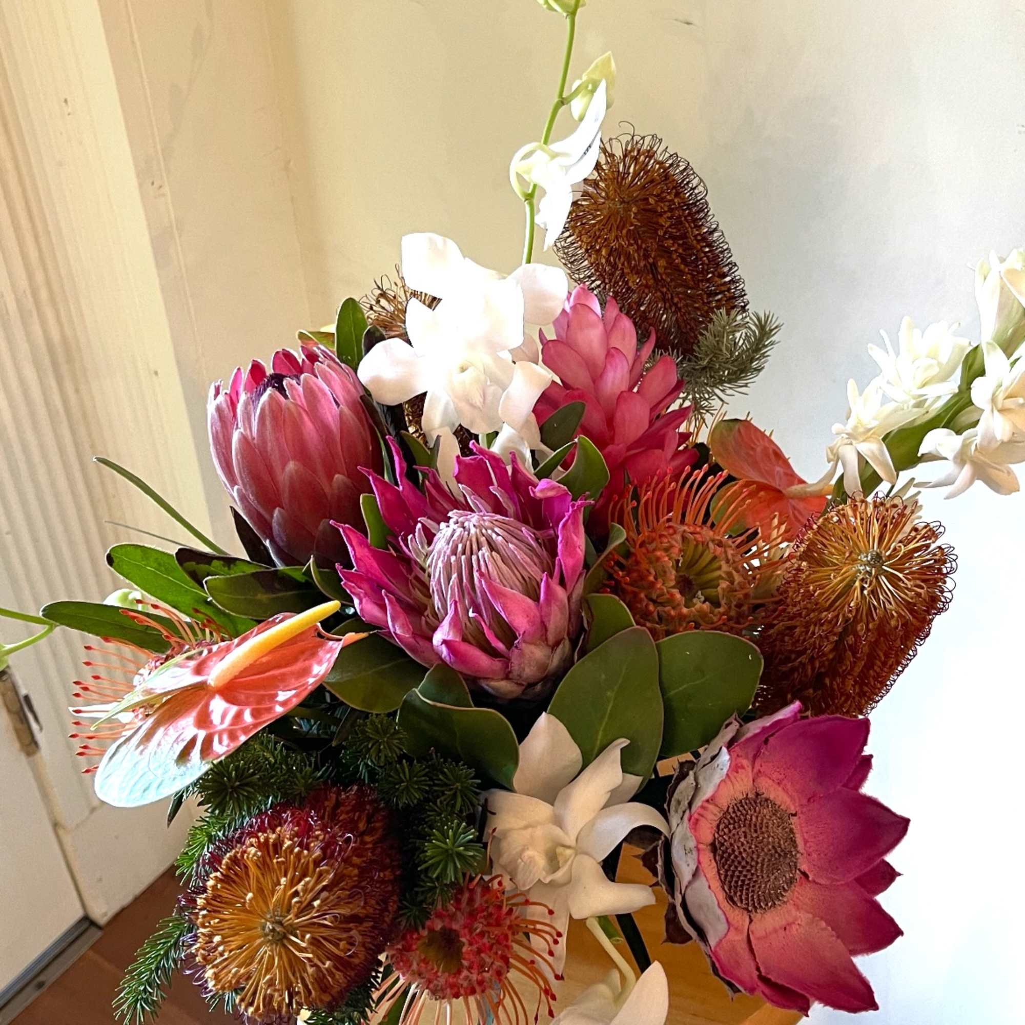 Celebrate your love with the vibrant and stunning &quot;Hawaiian Heart&quot; arrangement from