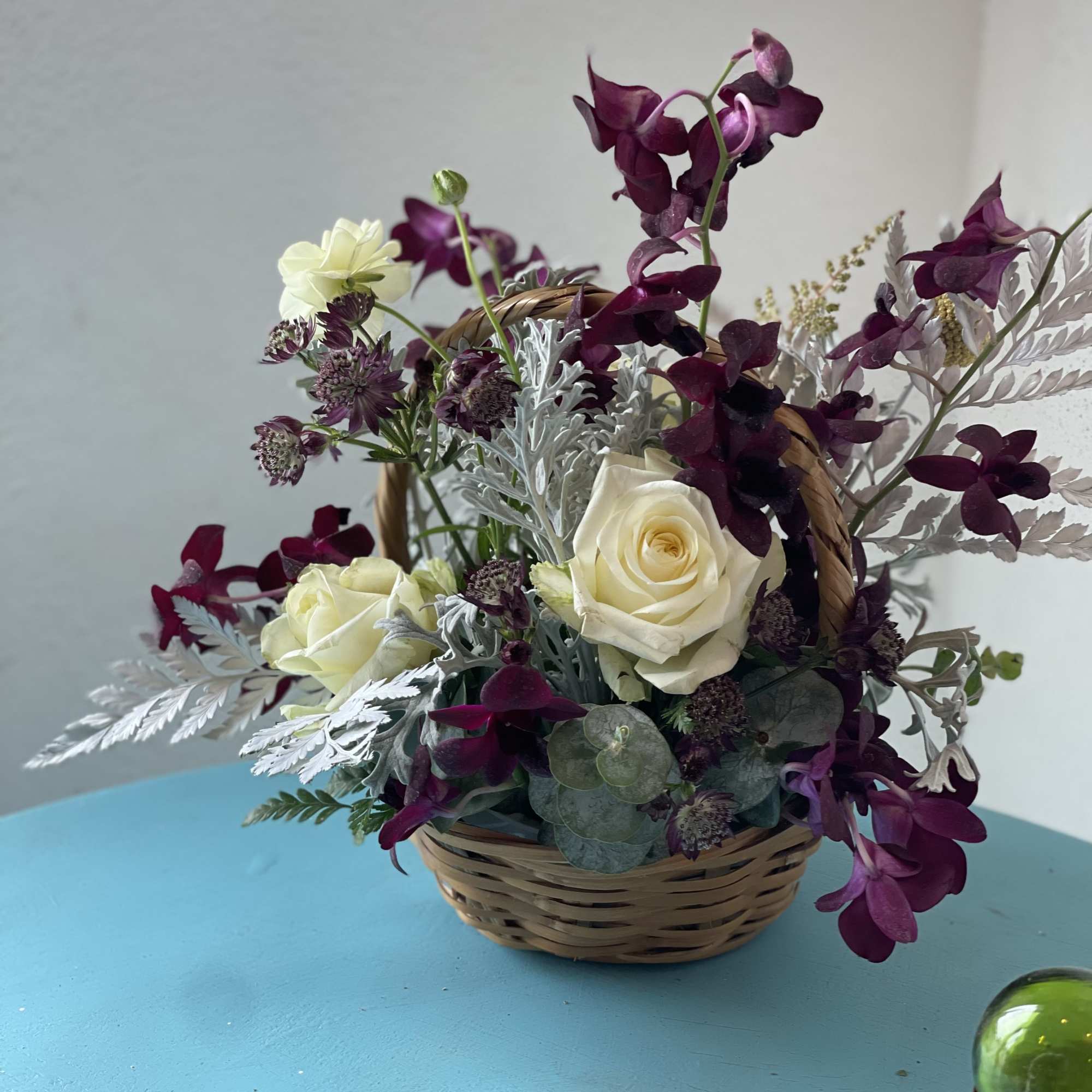 Dark purples, partnered with cream and white blooms. This exotic twist play
