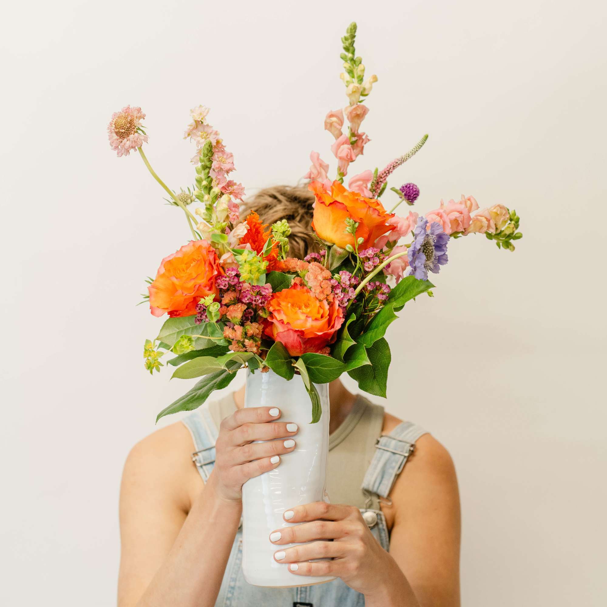 Our in-house designers will pick the best-looking florals and color schemes and