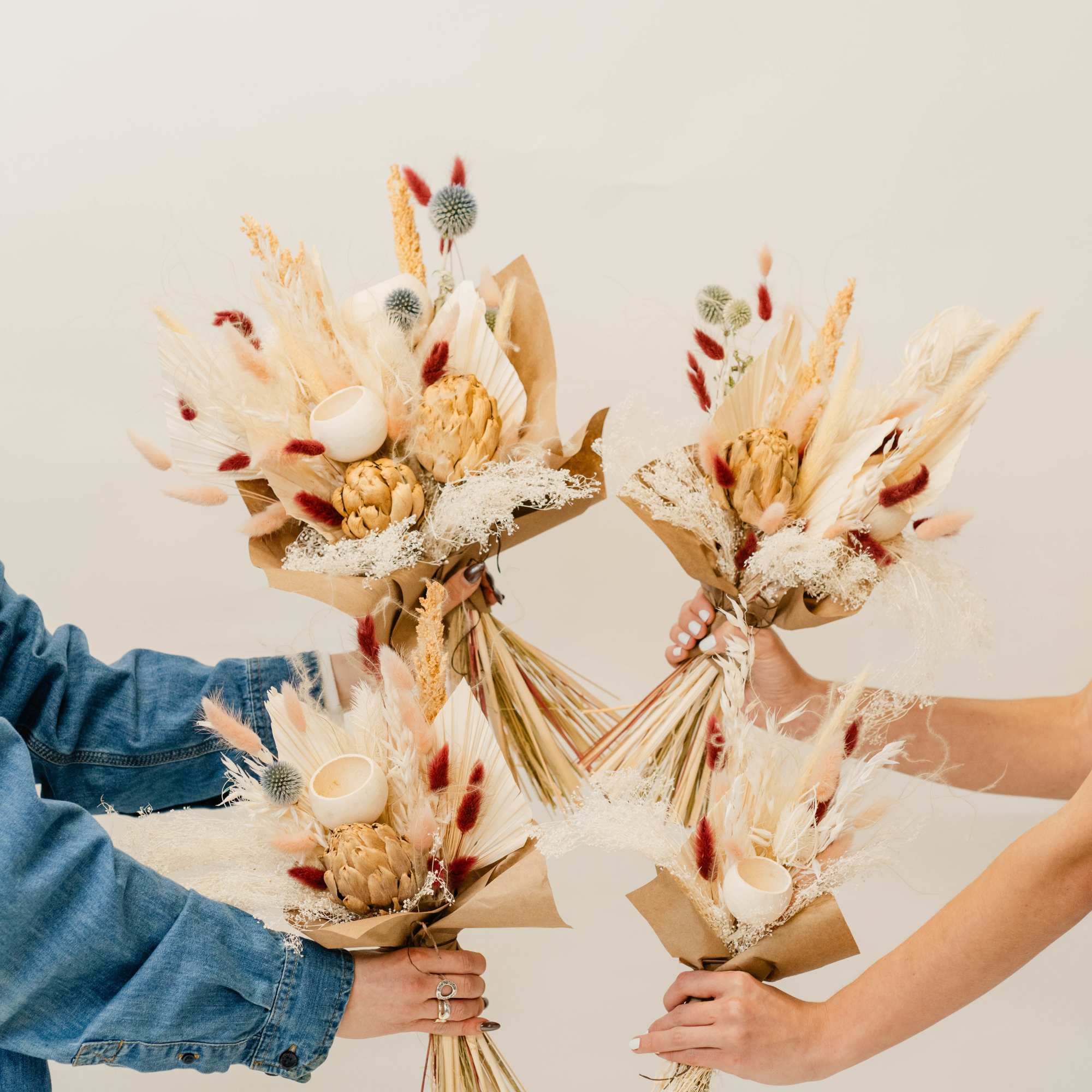 Our large dried hand-tied bouquet is a striking arrangement of preserved blooms