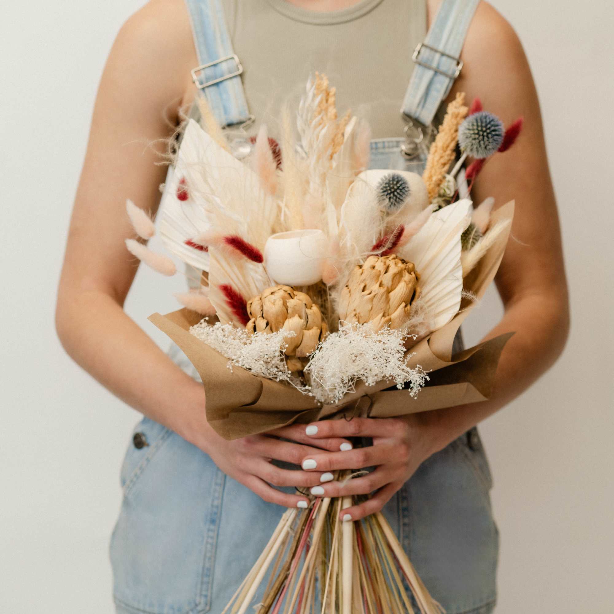 Our extra large dried hand-tied bouquet is a striking arrangement of preserved