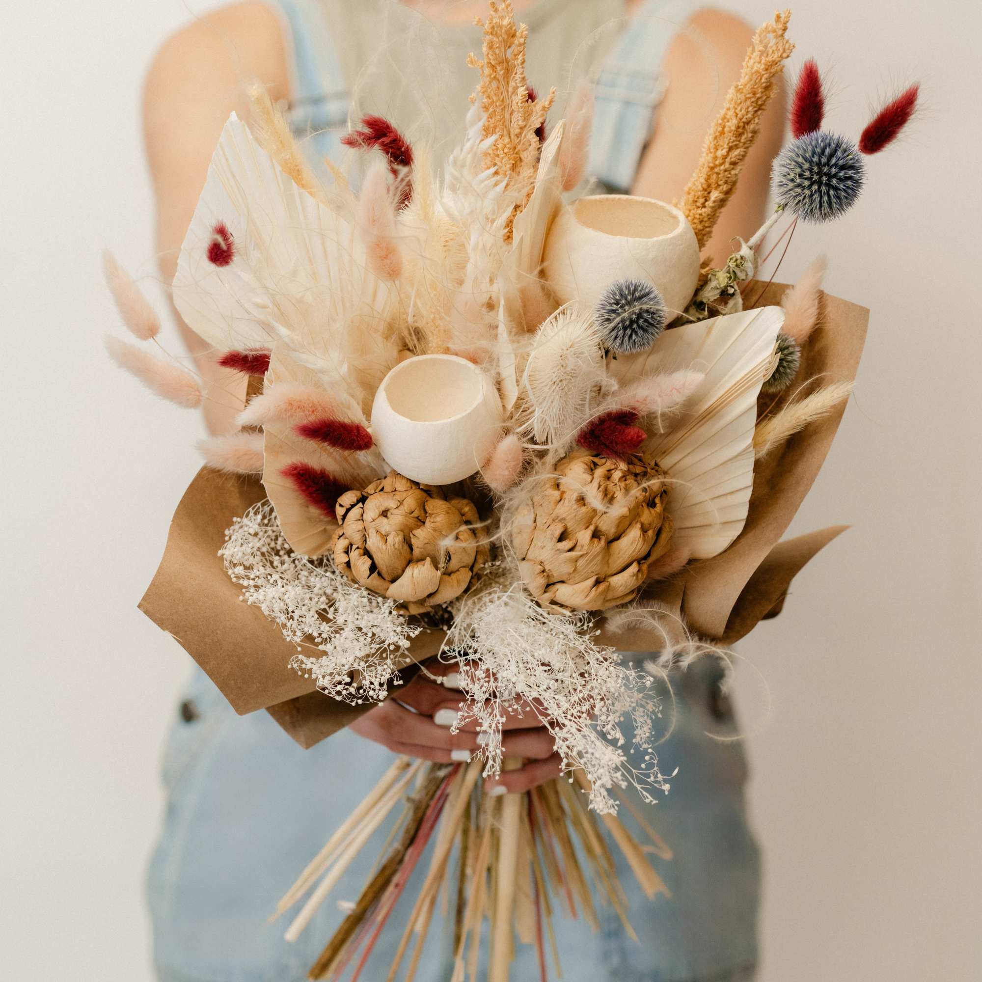Our extra large dried hand-tied bouquet is a striking arrangement of preserved