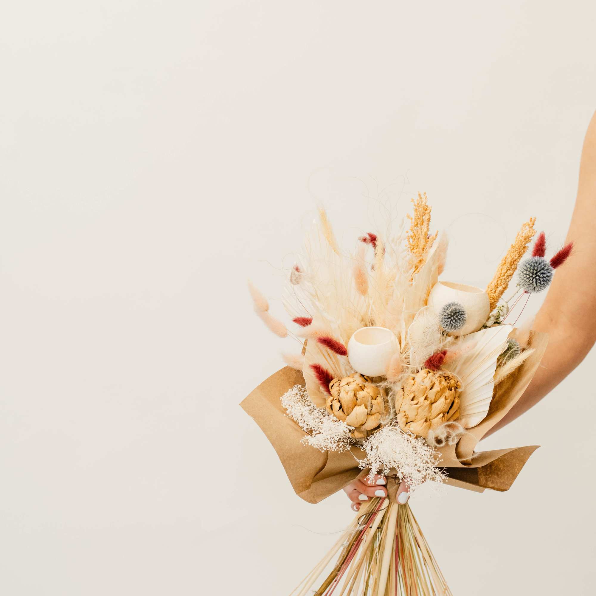Our extra large dried hand-tied bouquet is a striking arrangement of preserved