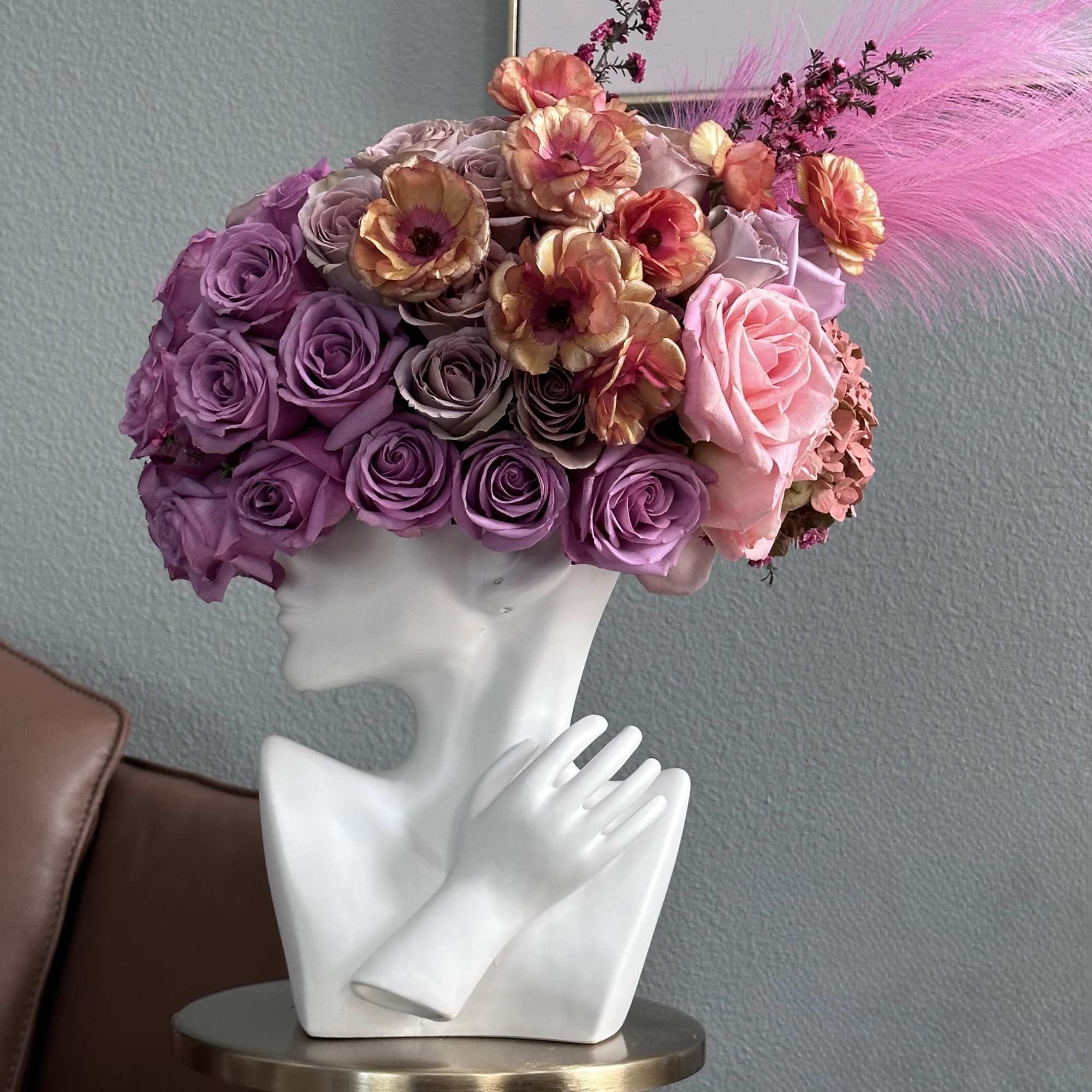 Featuring lavender roses and blush-toned blooms, elegantly designed in a sculptural ceramic