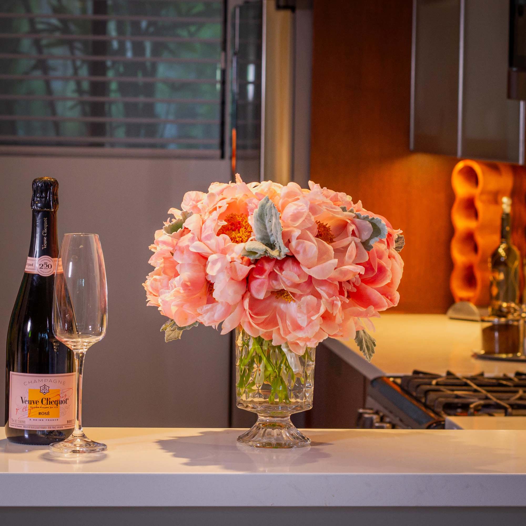 Embrace the enchanting beauty of a floral masterpiece where delicate peonies, each